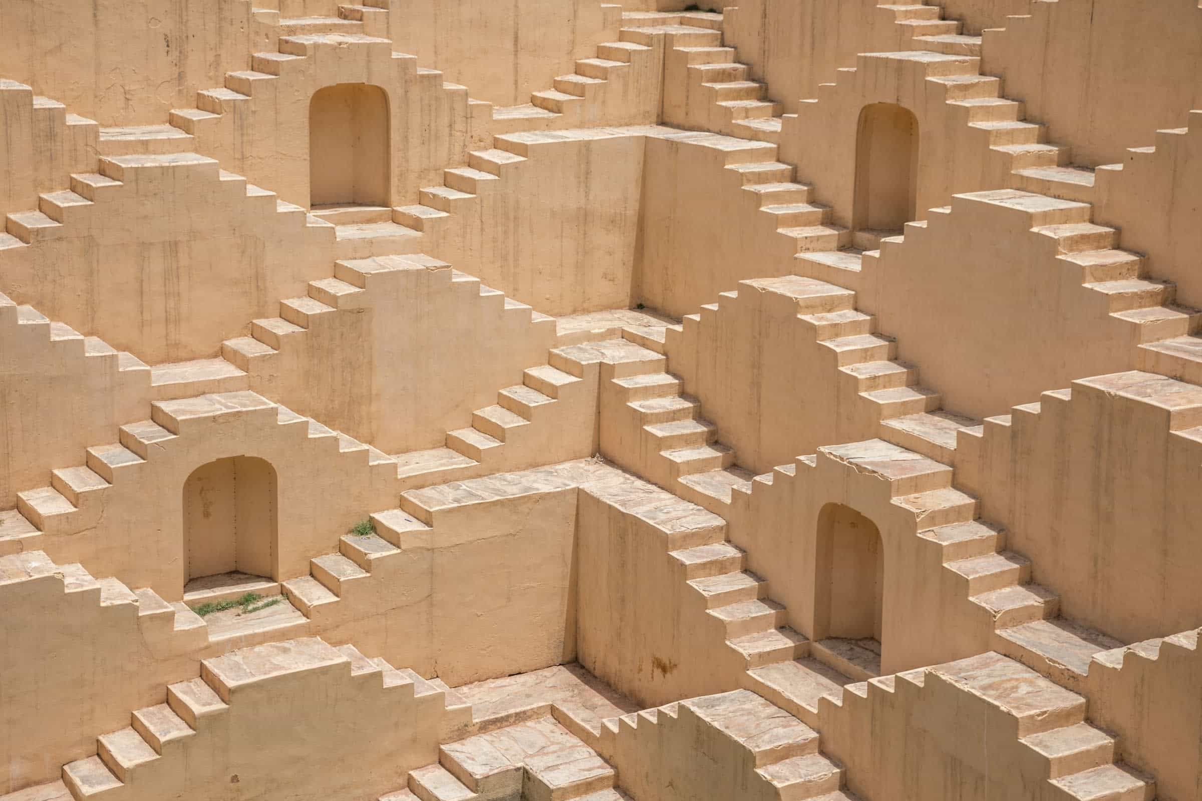 Large complex of beige criss crossing stone stairs