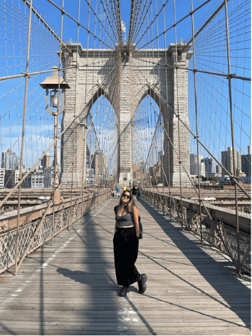 Standing on the Brooklyn Bridge.