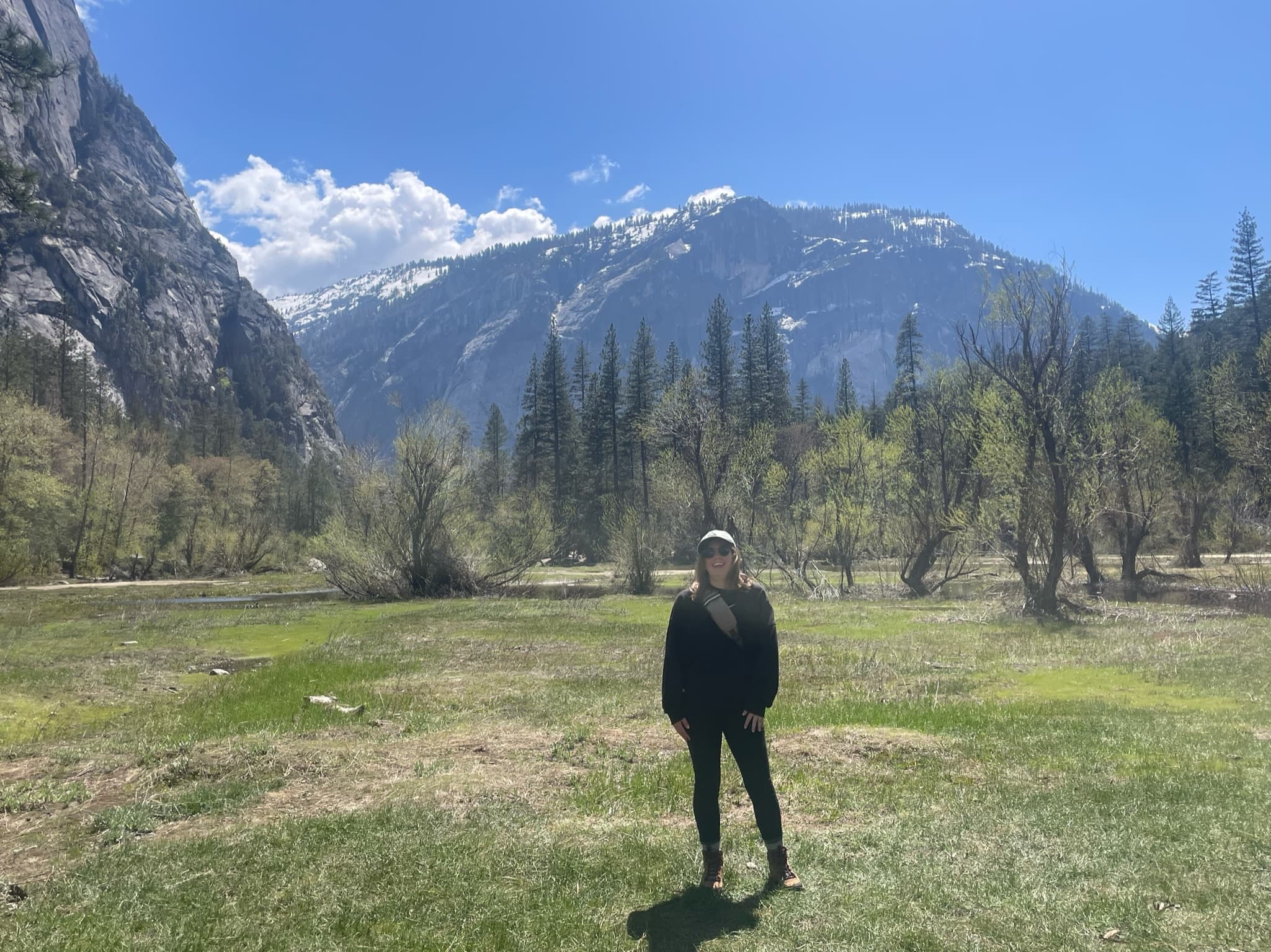 Melissa posing in front of the mountains.