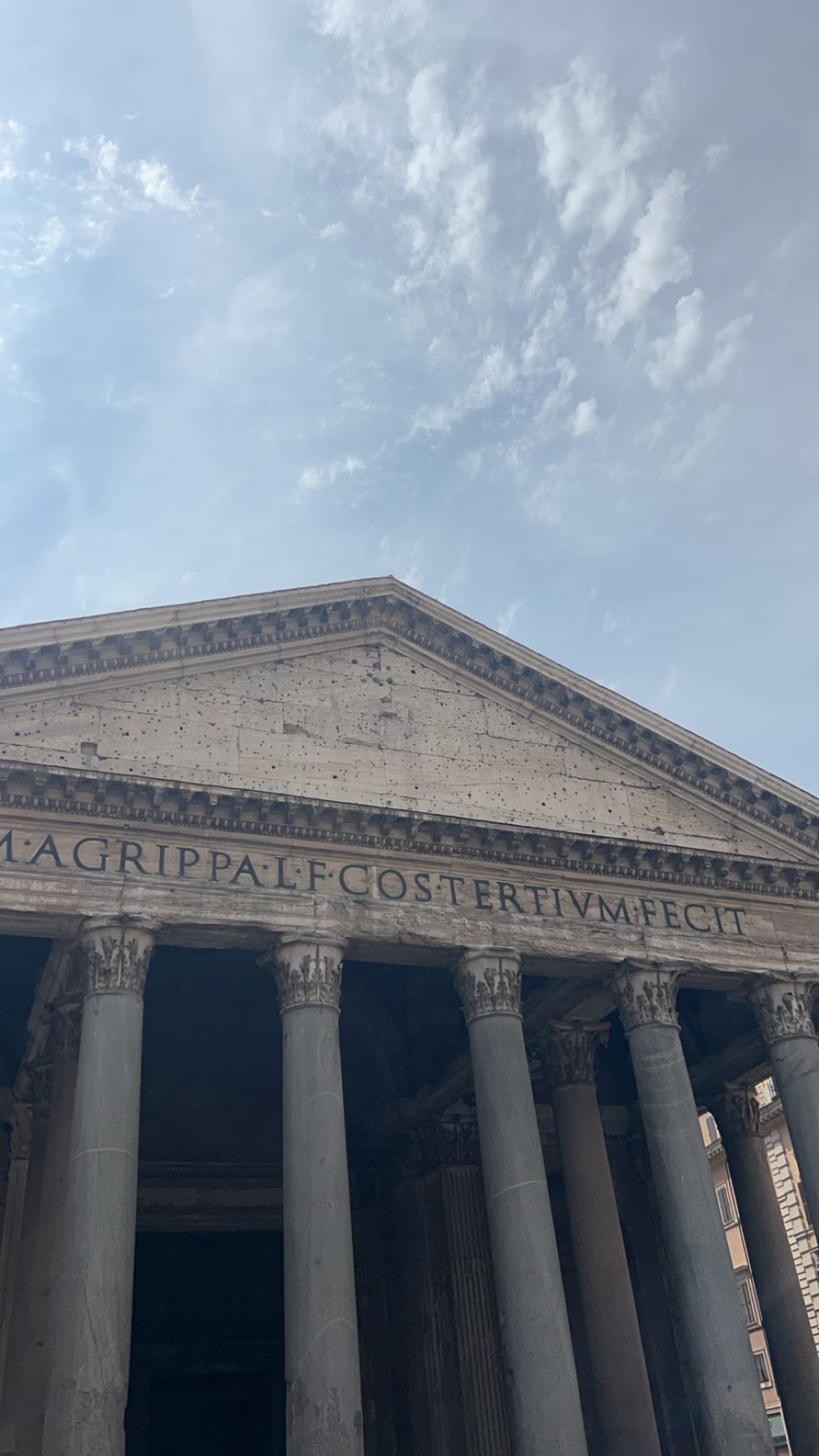 View of the top of the Supreme Court in Washington DC on a sunny day