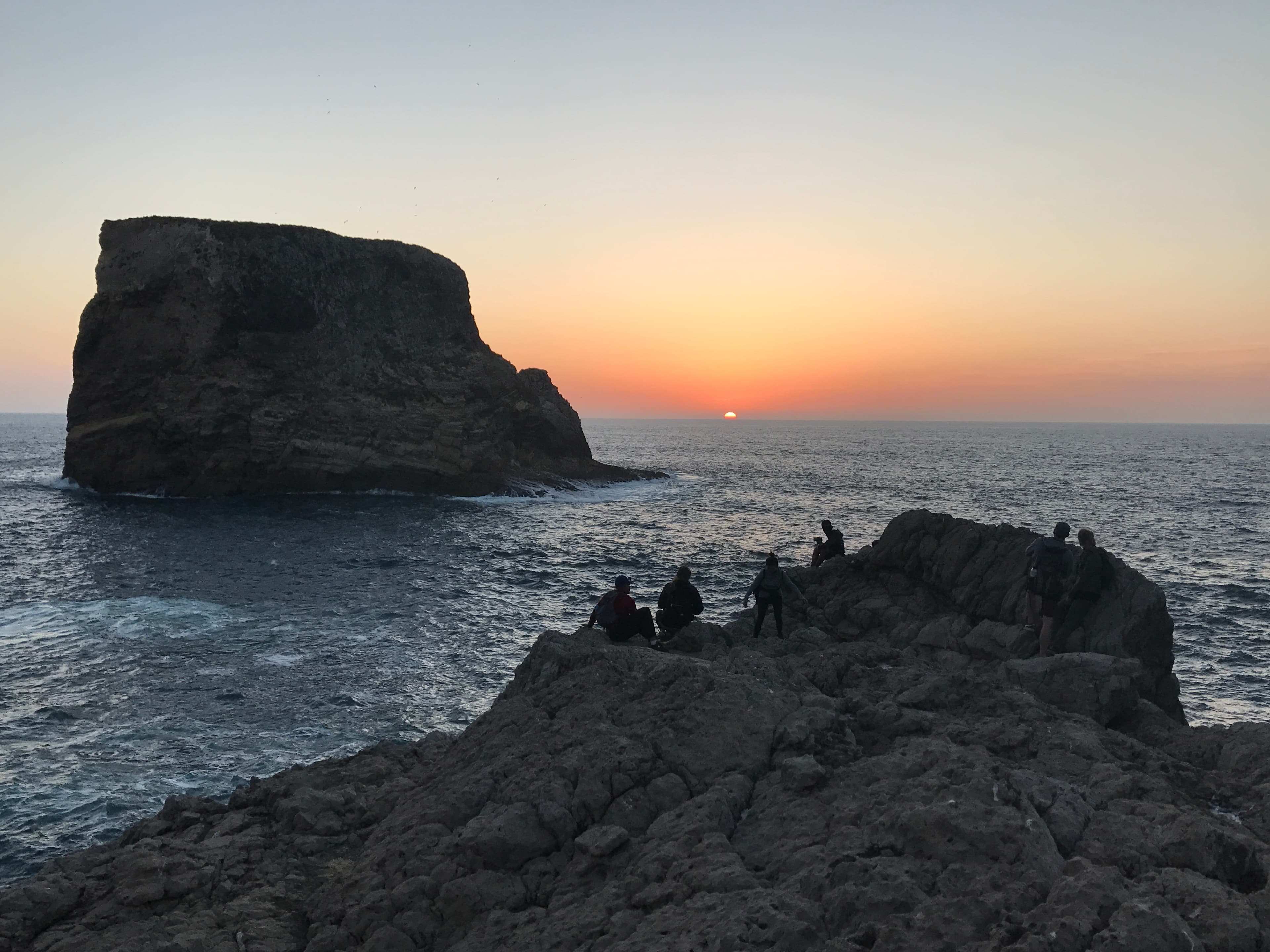 Sun kisses the horizon of the sea