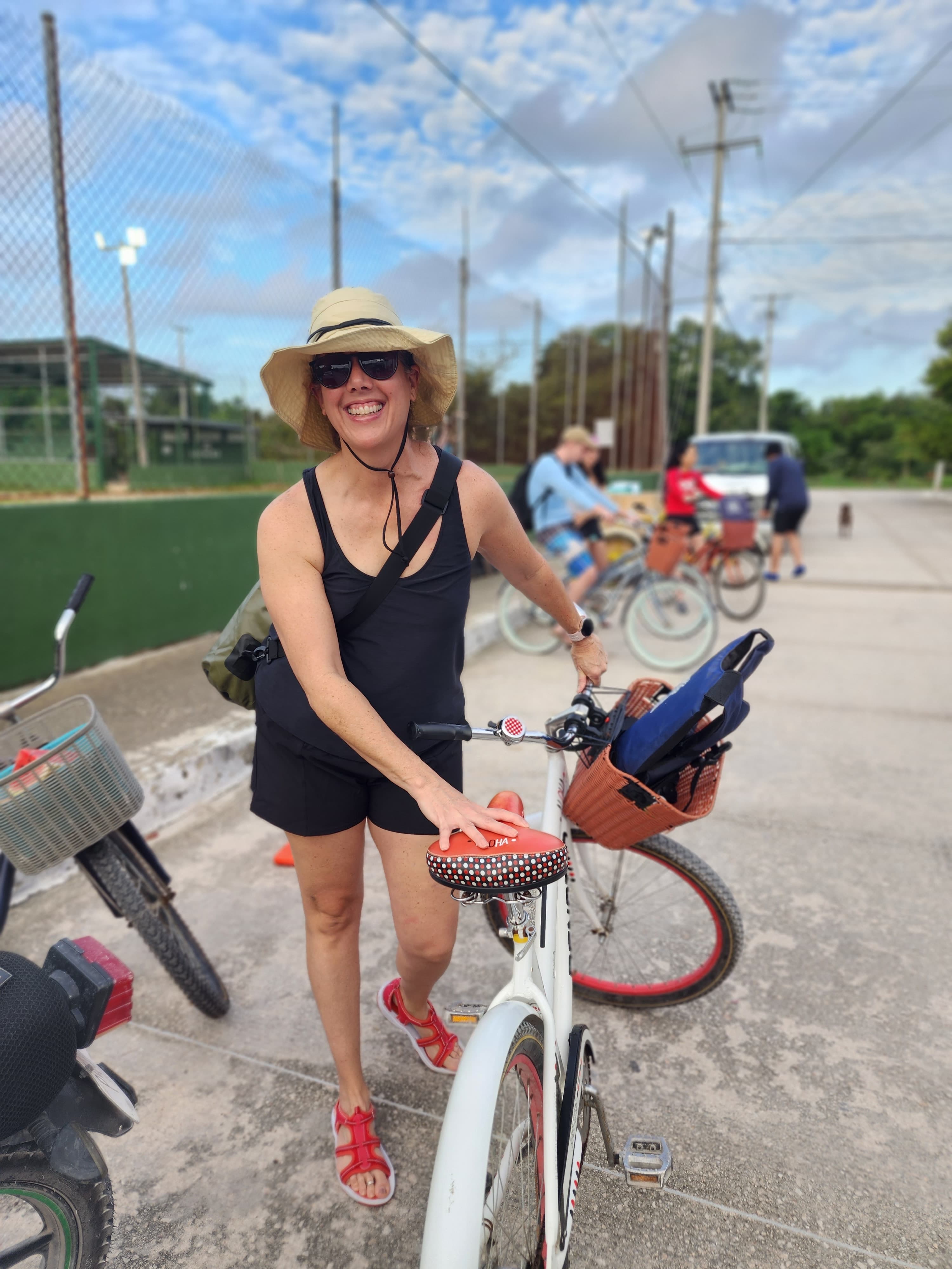 Travel advisor posing holding a cycle