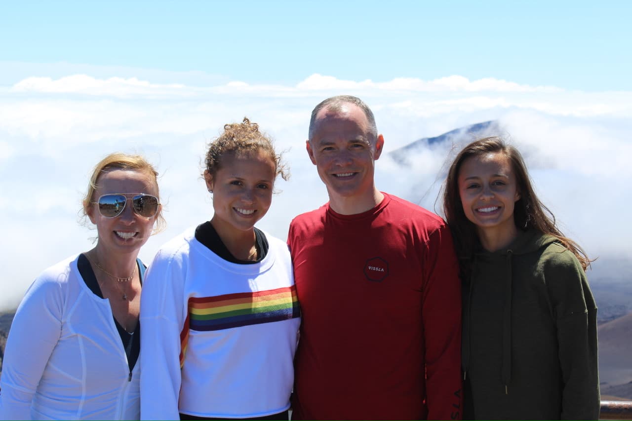 Lisa posing with her family