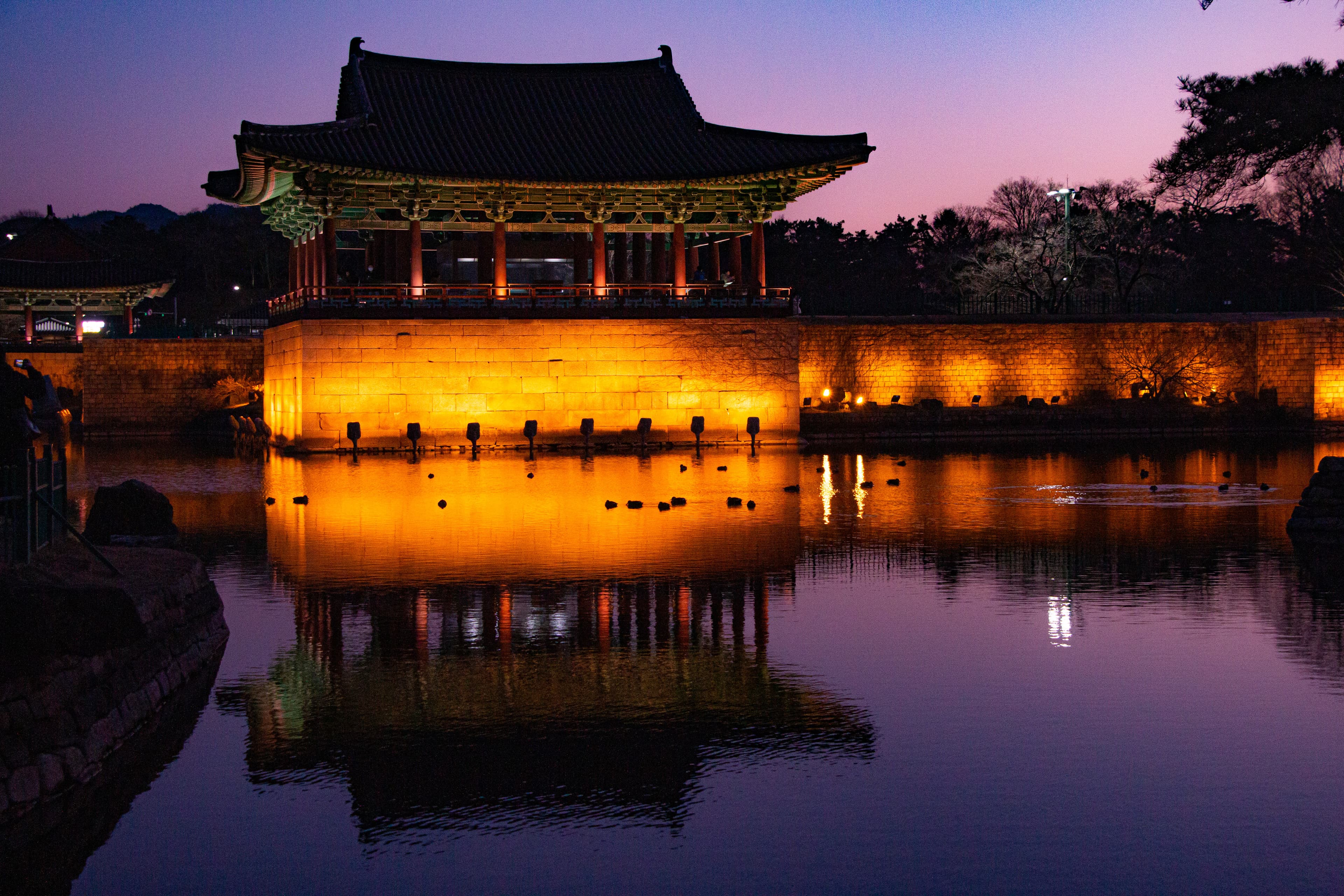 View of a hut beside lake