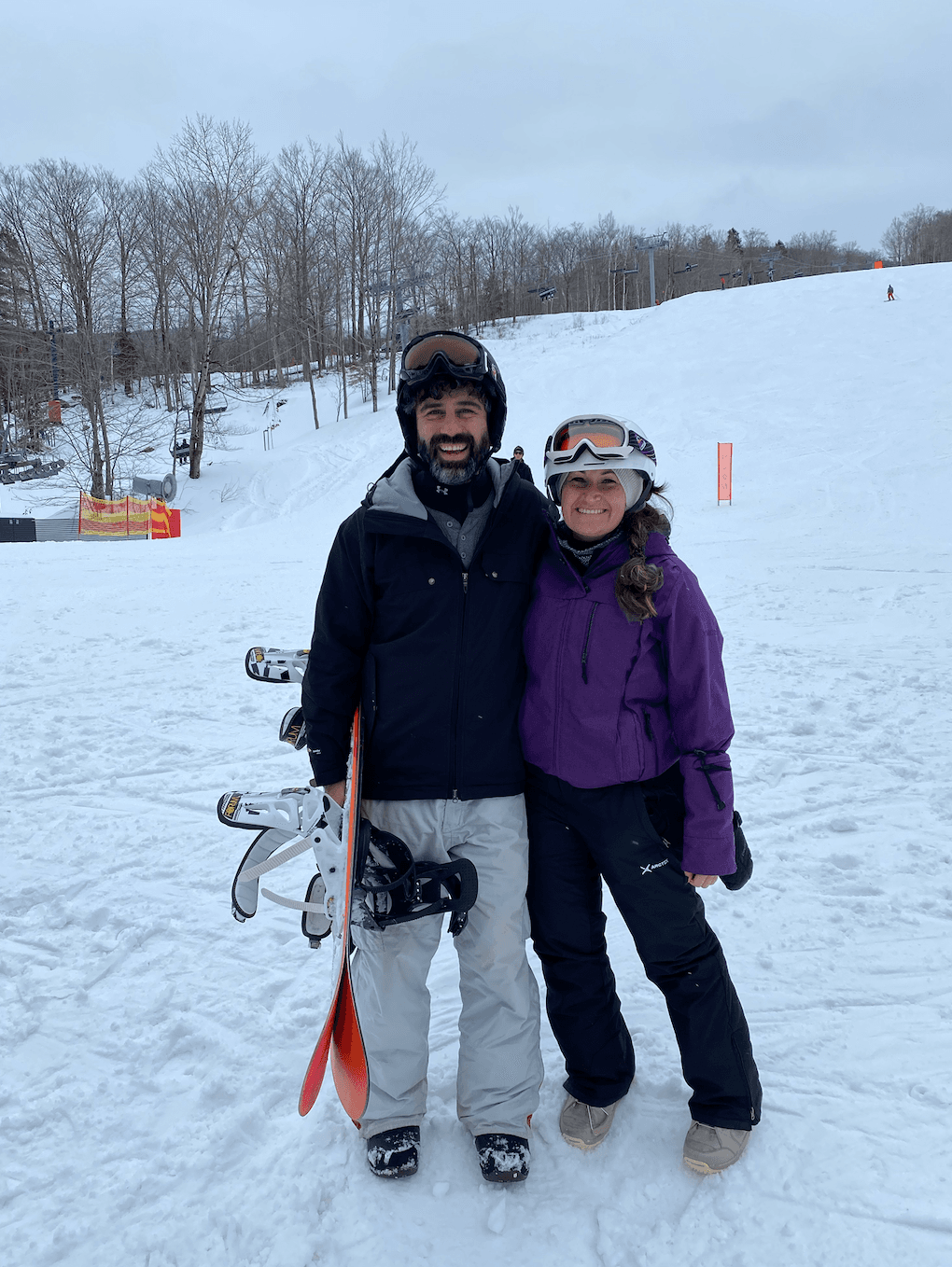 Couple posing in a snowy region