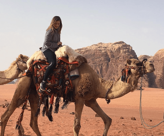 AmryAlexa riding on Camel's back