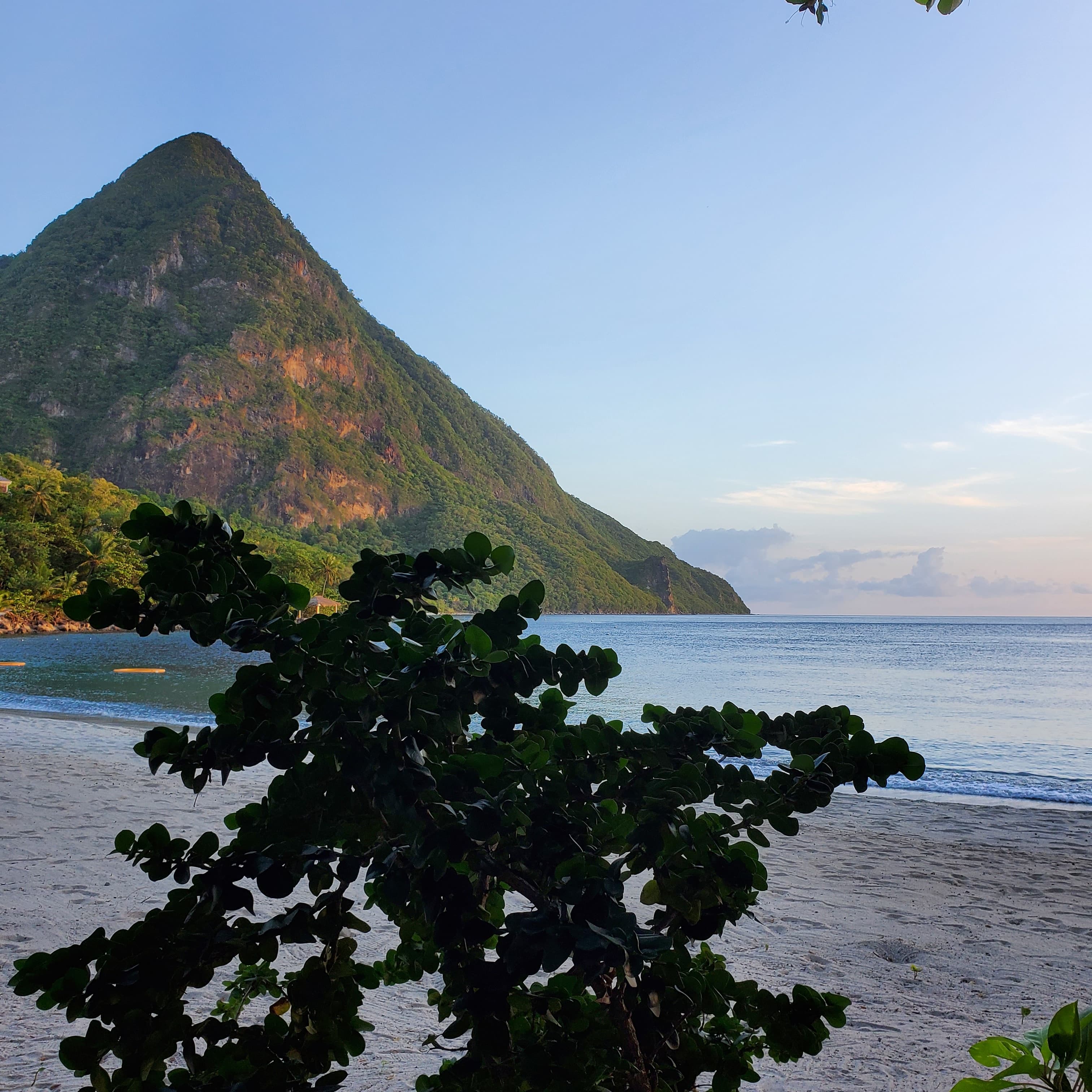 Sea under the shade of mountain