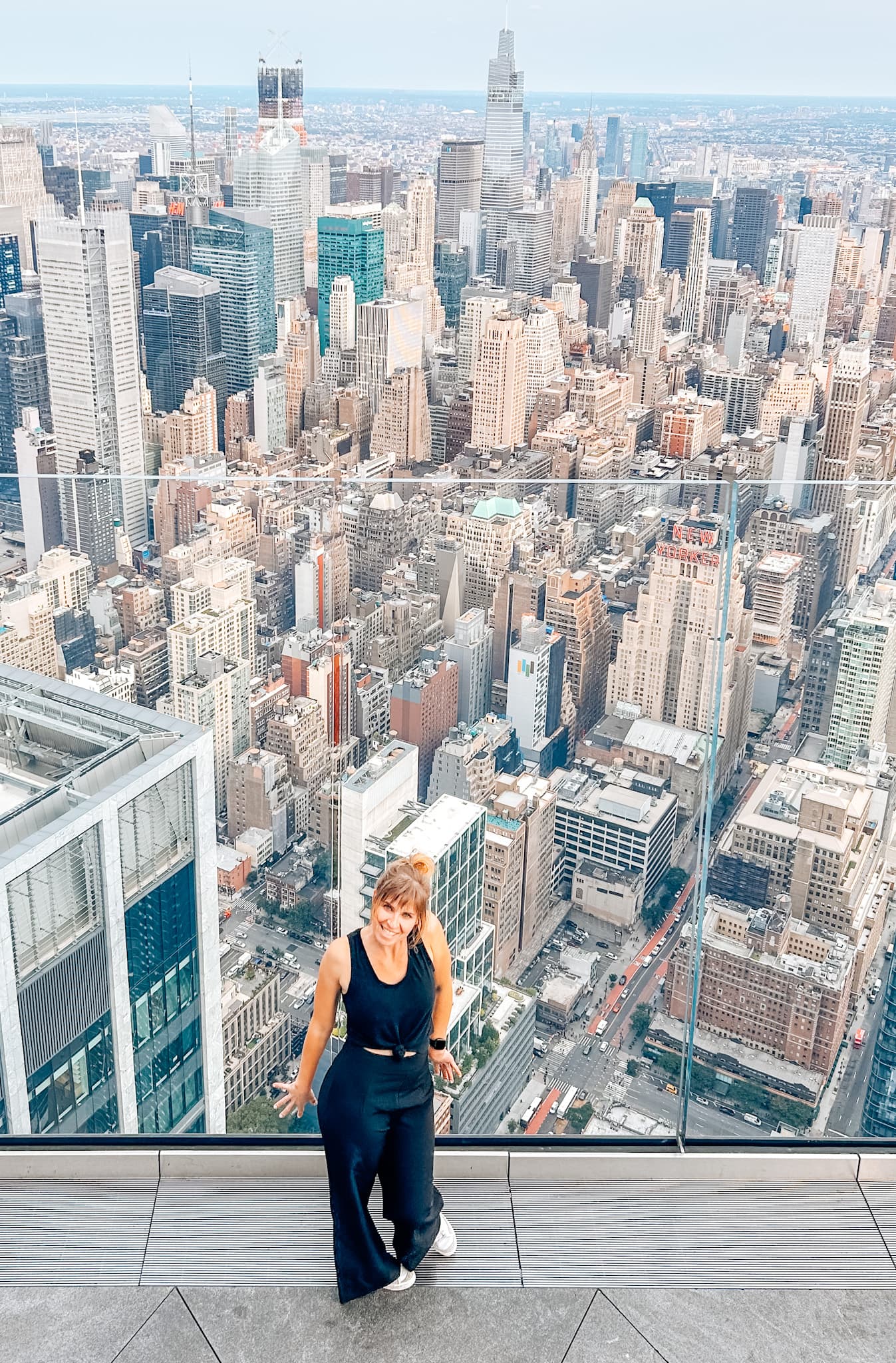 Bren posing with city in the background