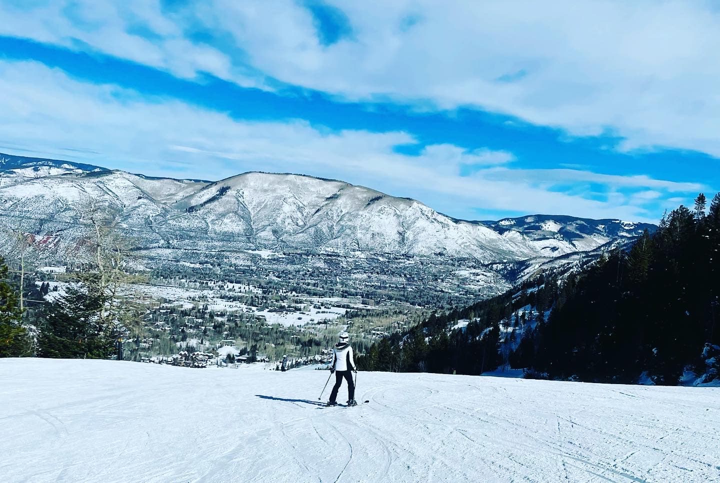 Travel advisor posing in a snowy region