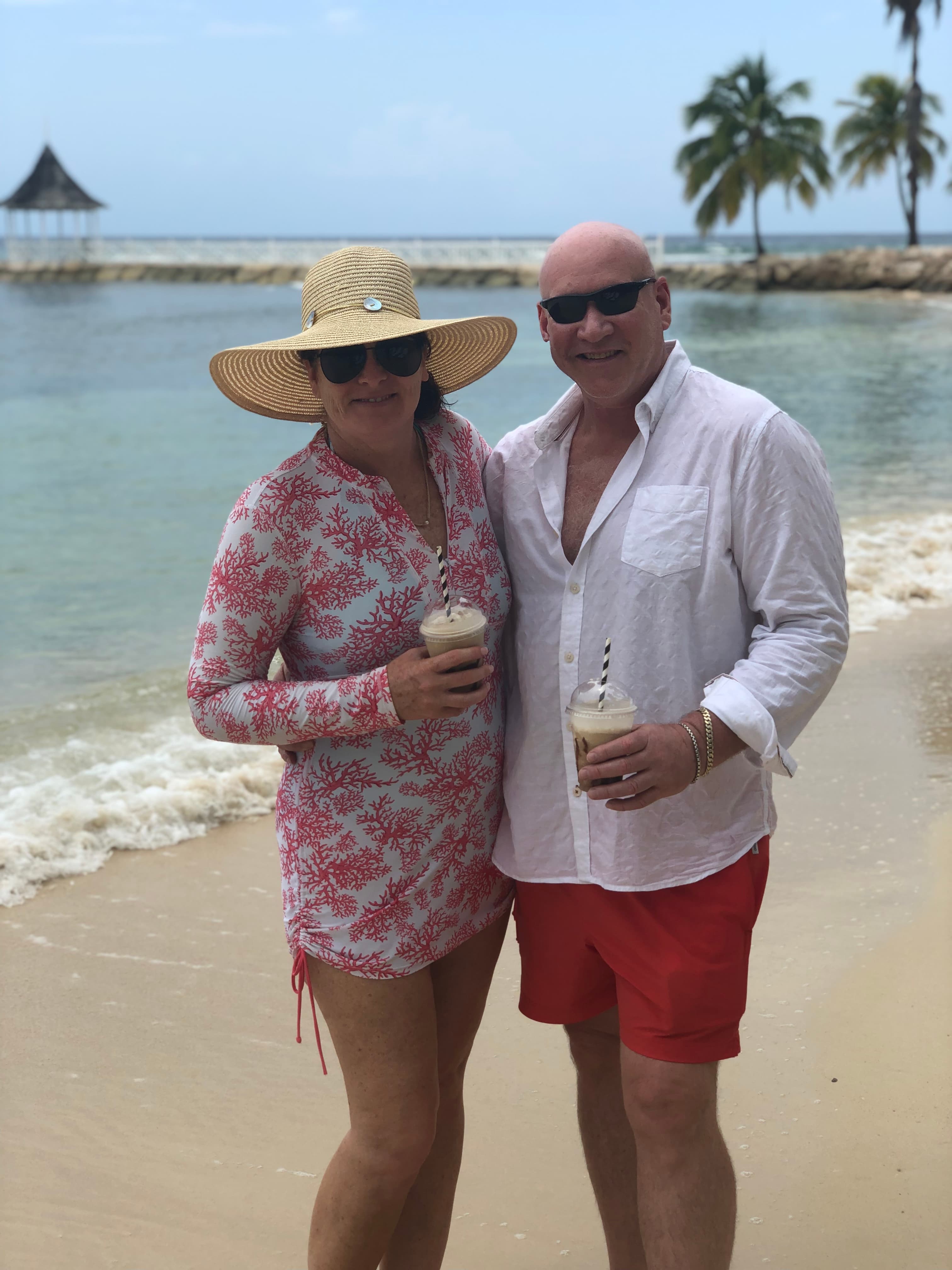 Terri with her partner at a beach