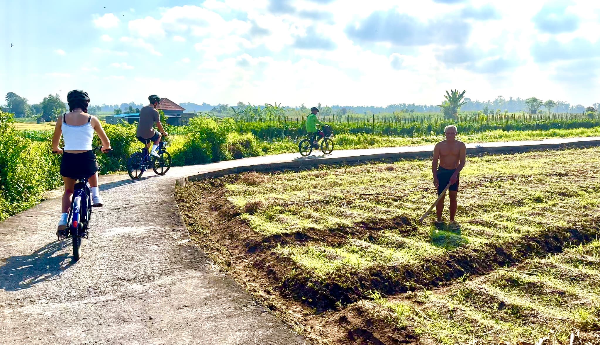 Travel advisor cycling in a field