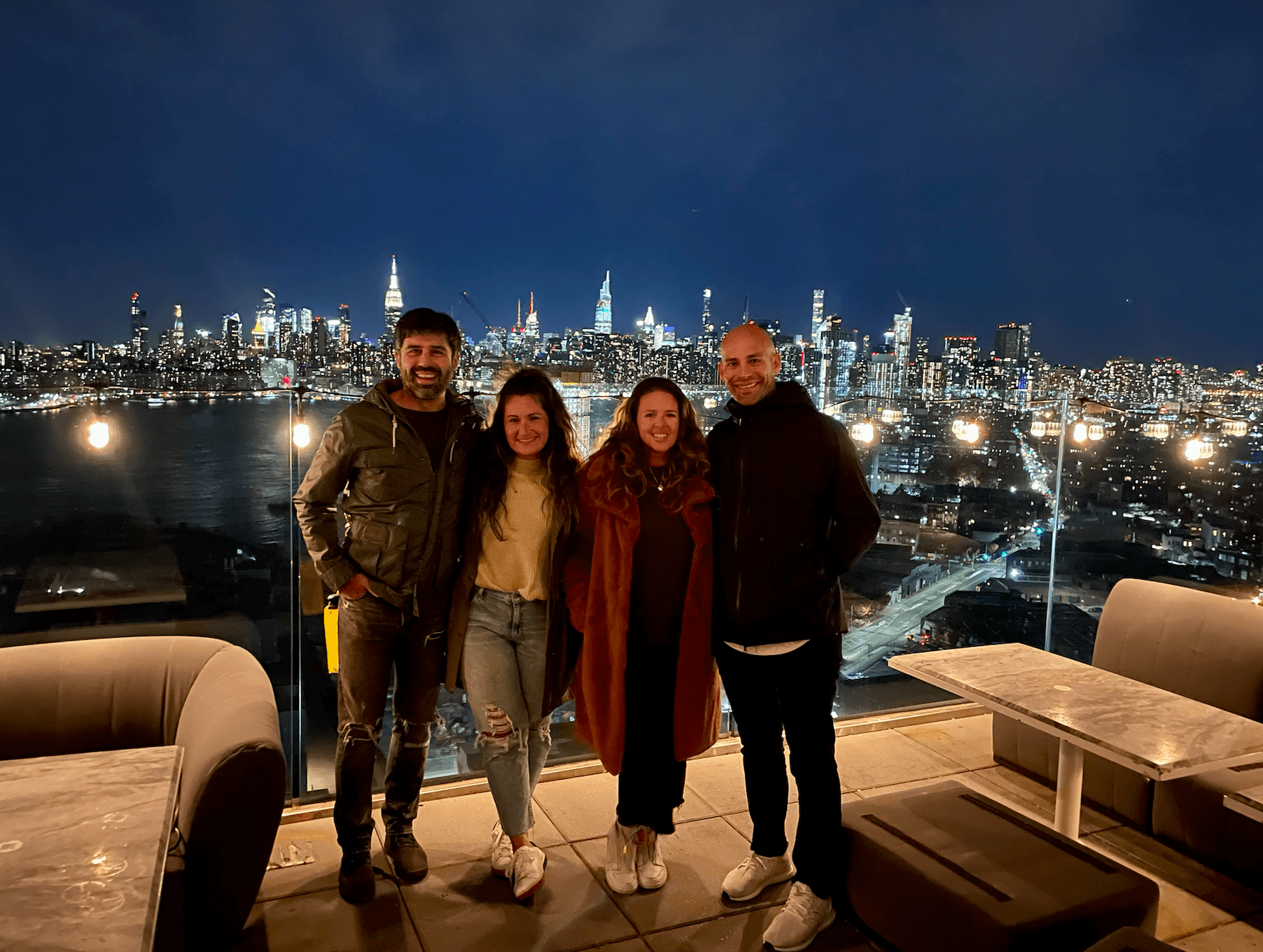 Group photo with night city view