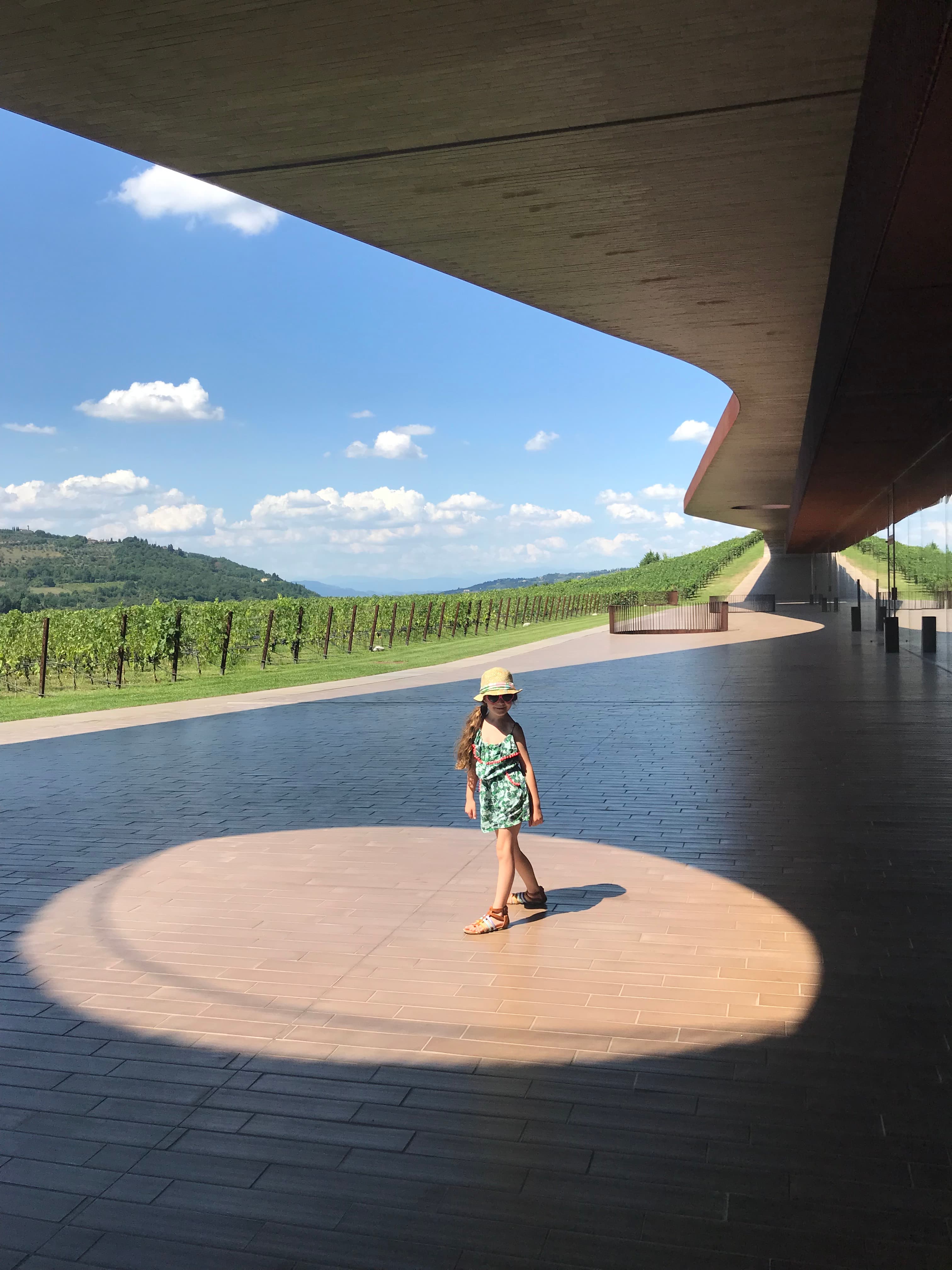 A girl at a wineyard.