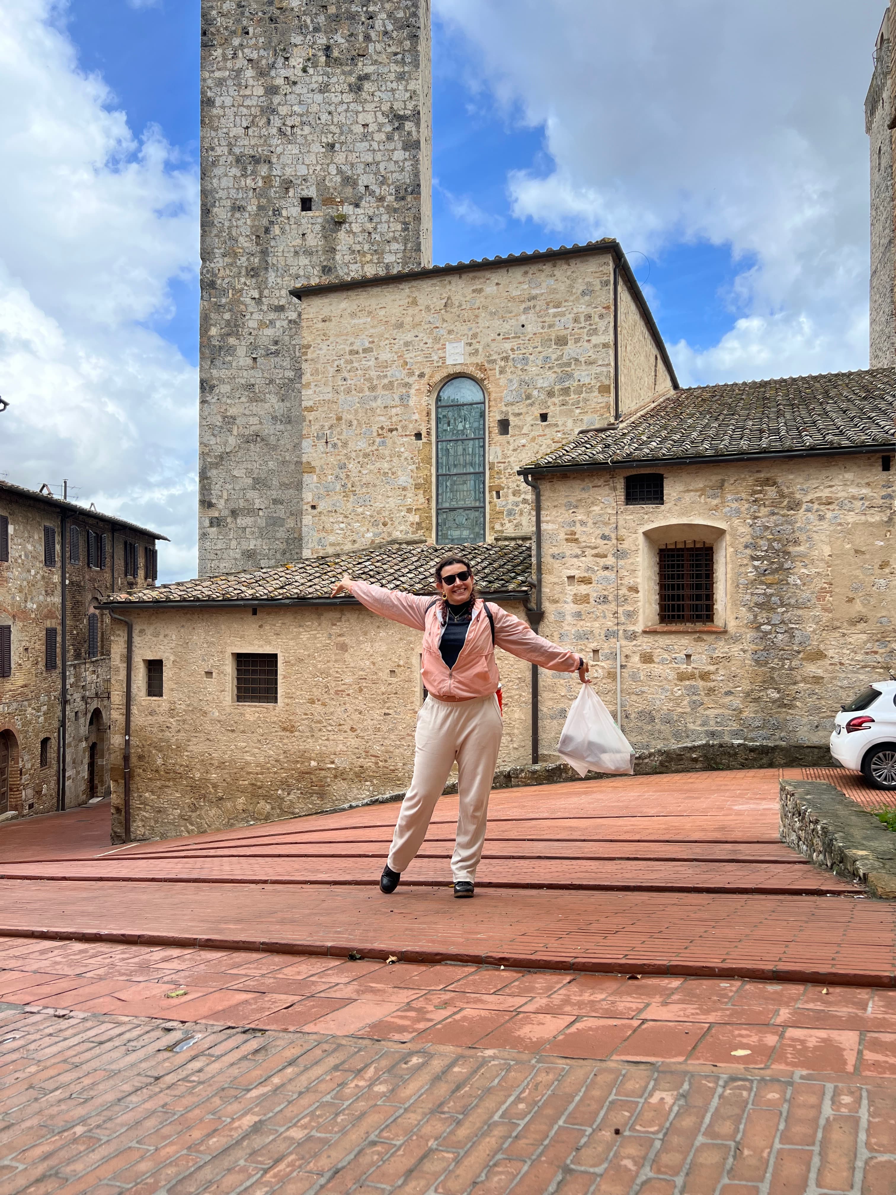 Lauren in front of a brick building