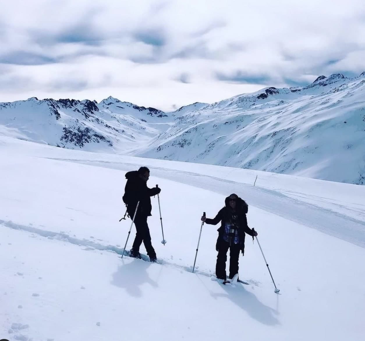 Picture of Sarit skiing on a snow covered mountain with fresh powder.