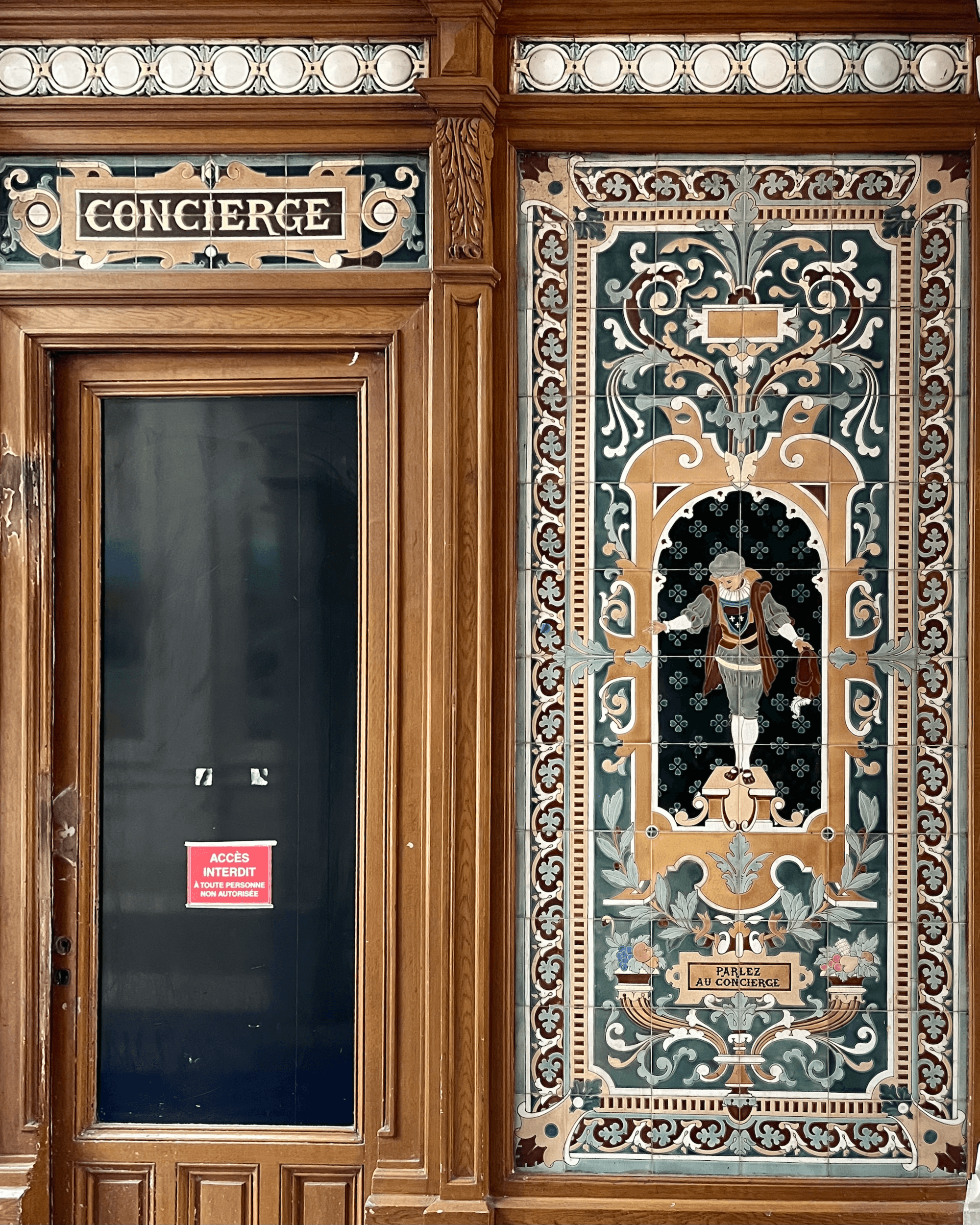 A decorative concierge door with intricate patterns on it,