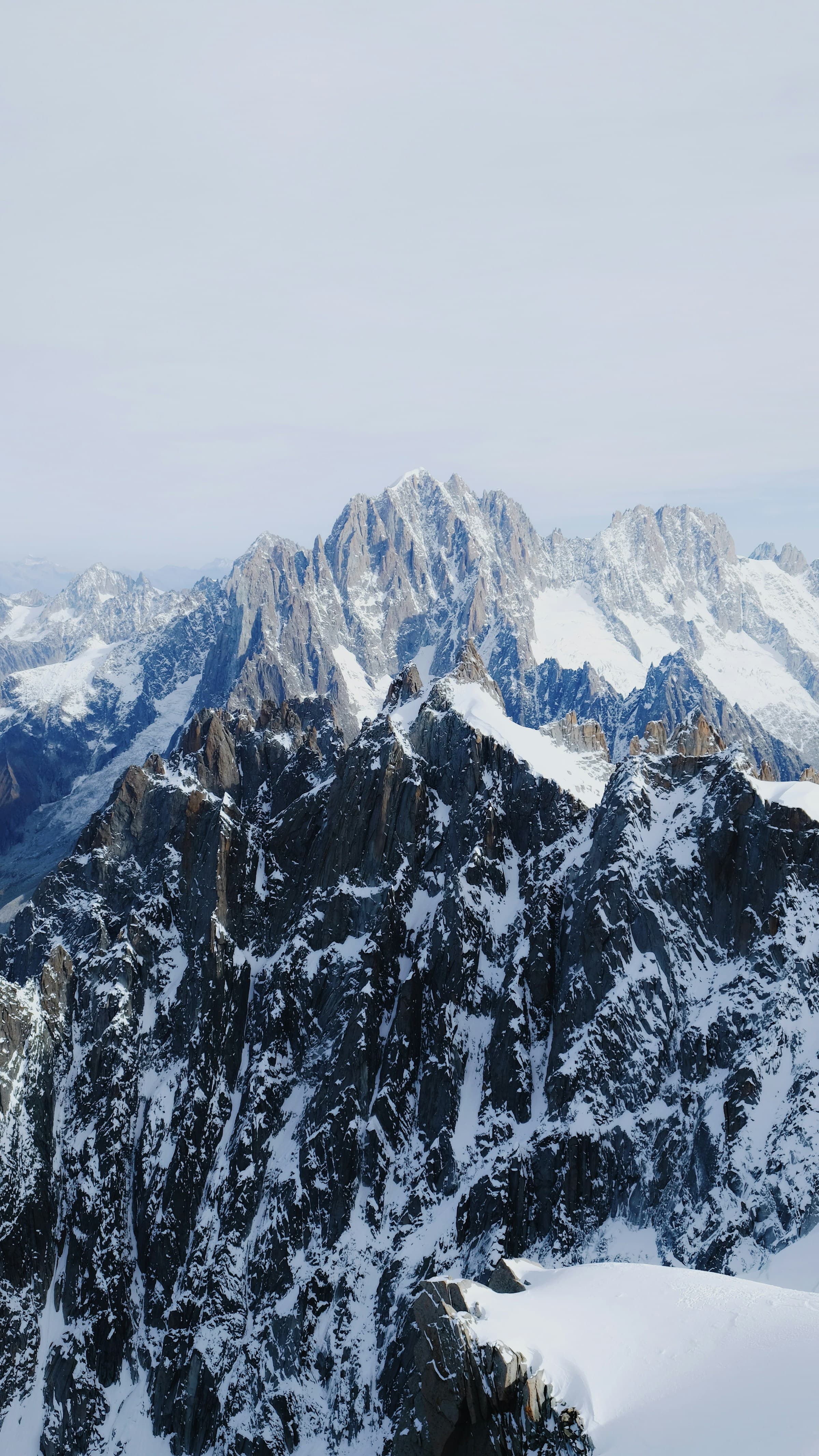 The French Alps on a sunny day with a breathtaking view of a mountain range.