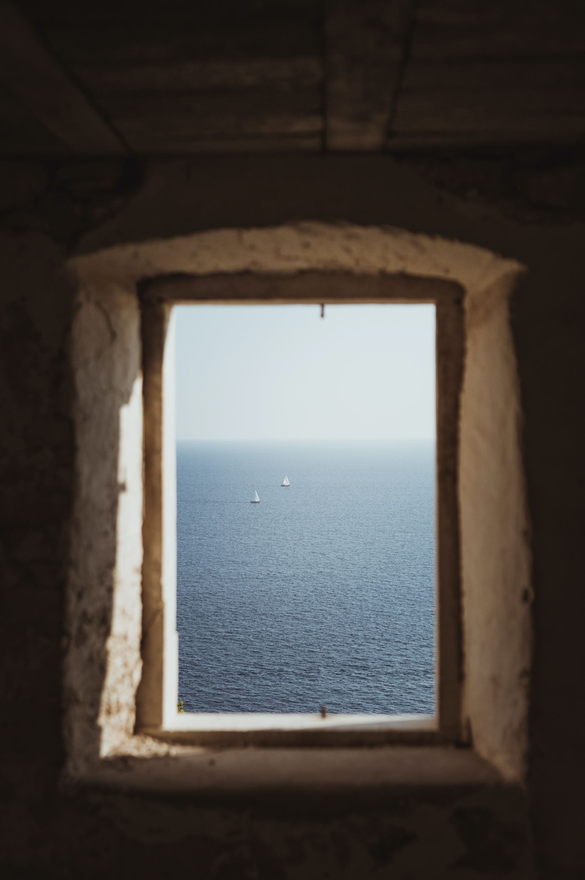 ocean through stone window