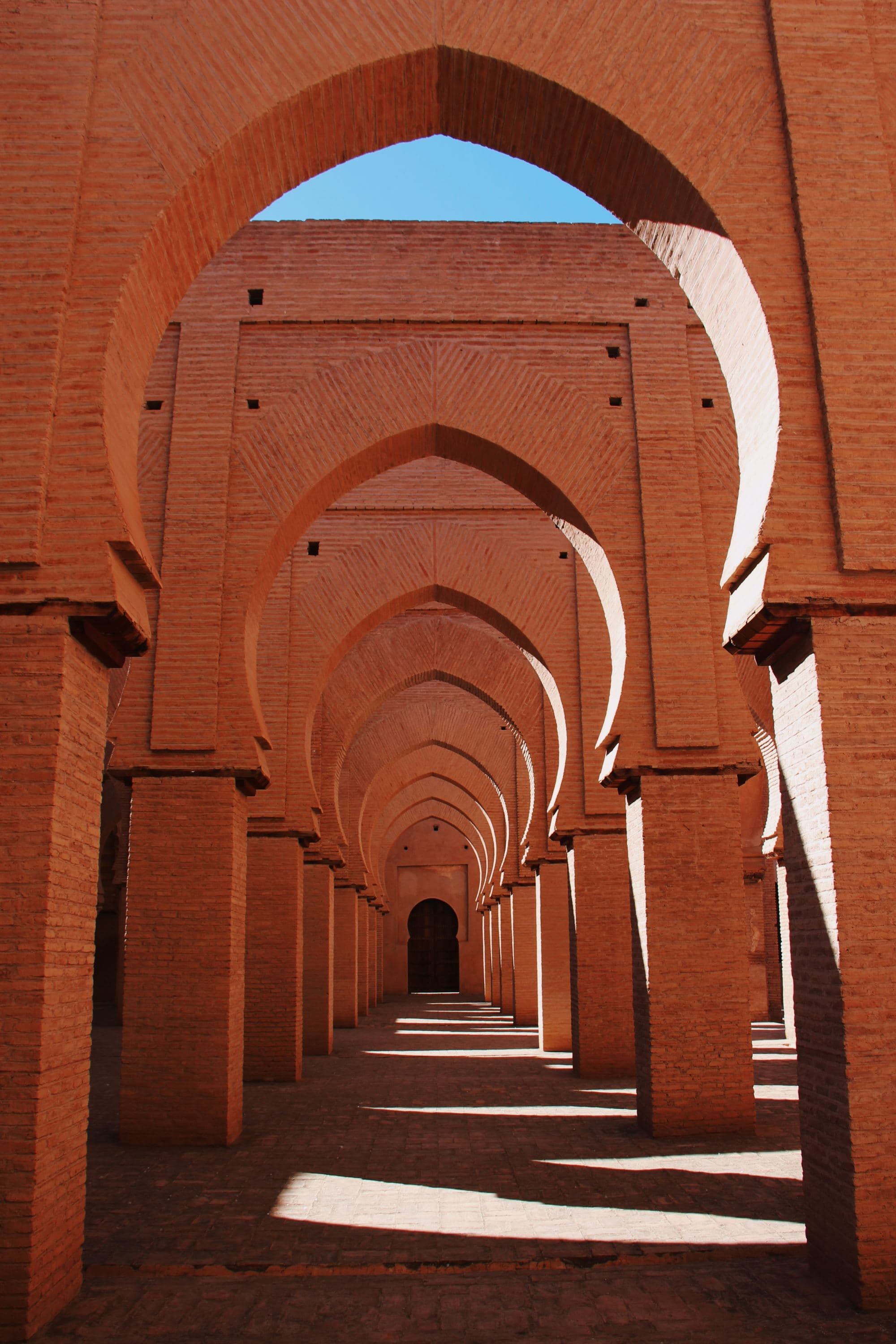 A series of brown concrete corridors outdoor during daytime