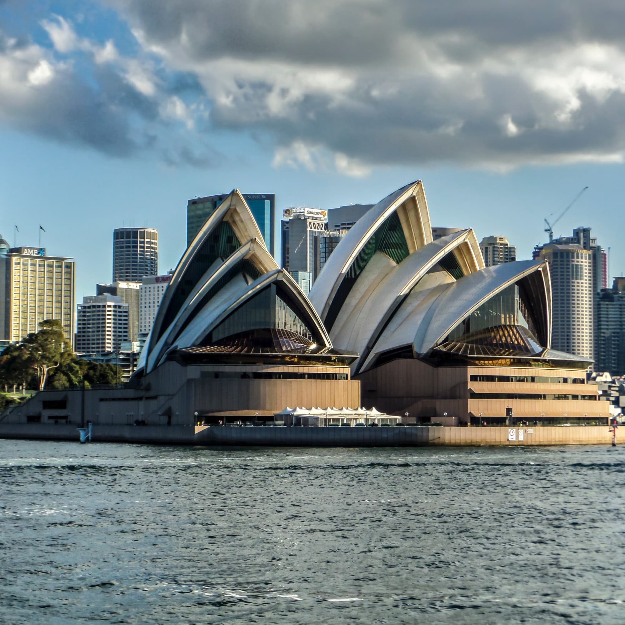A view of the Sydney opera house from across the water.