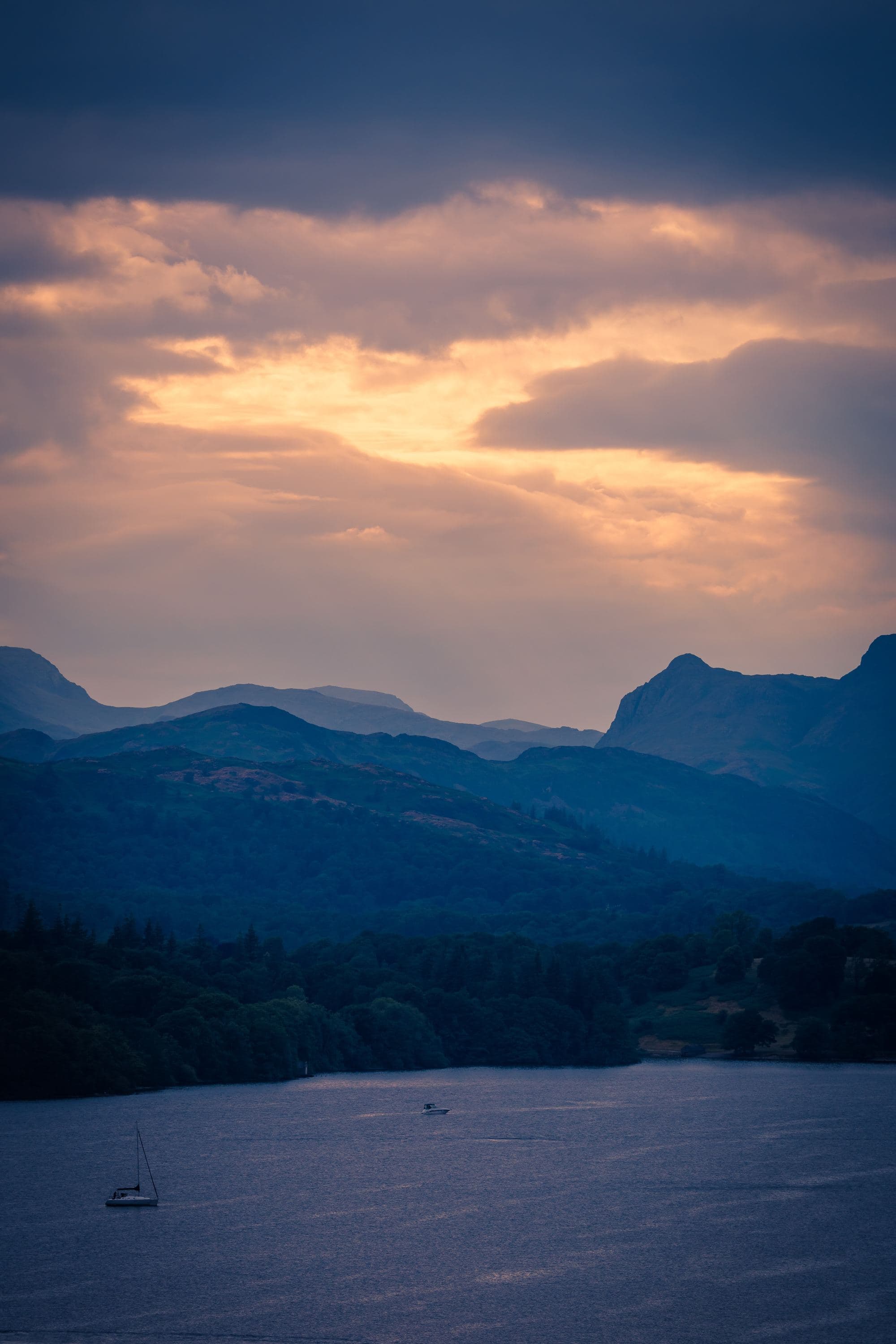 Mountain peaks behind the lake.
