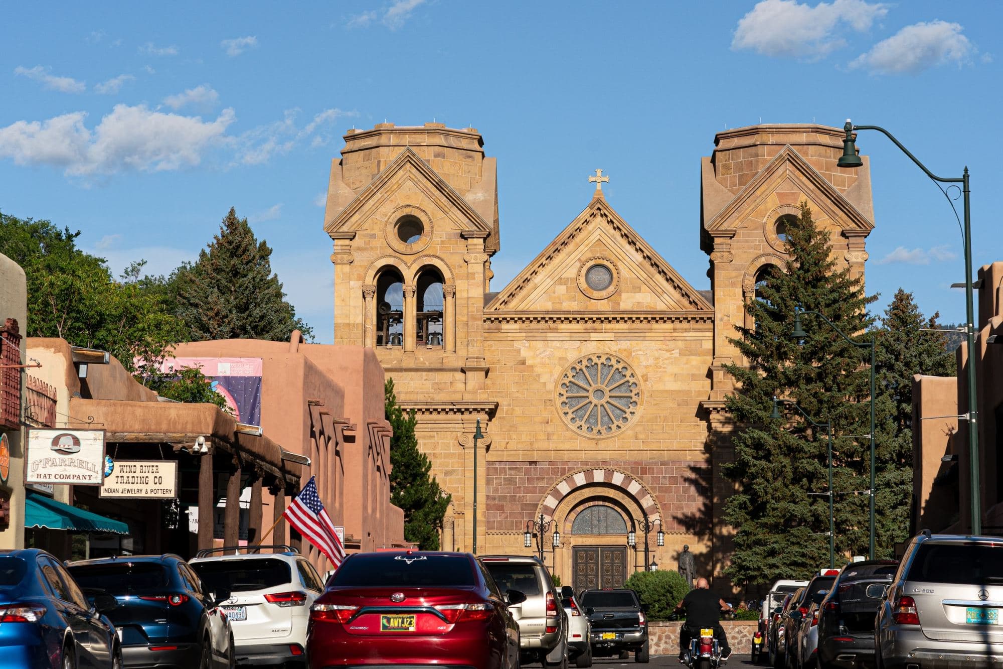 Old-West style streets leading up to an ornate Spanish Cathedral in the heart of Downtown Santa Fe (Photo by Nick Castelli)