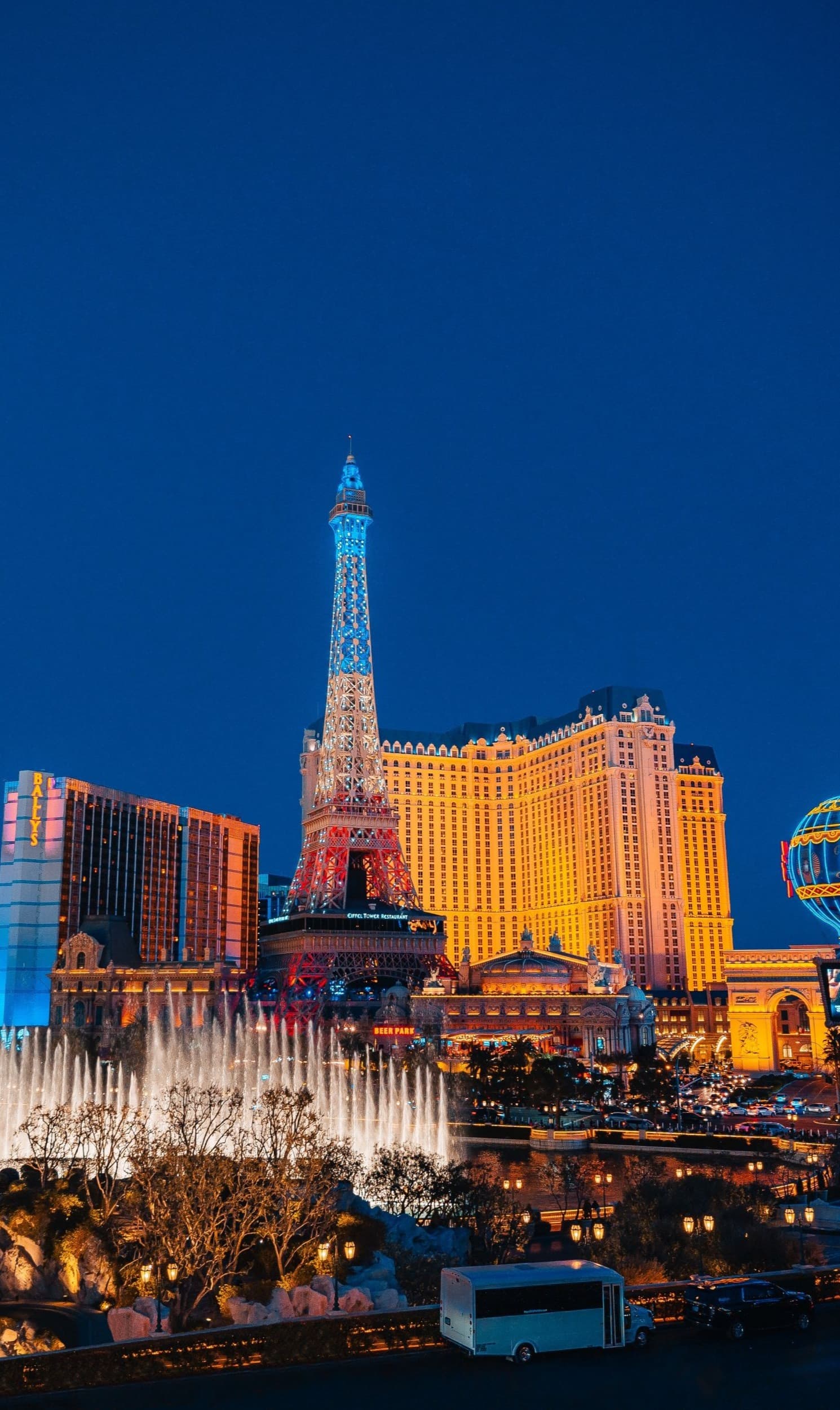 bright lights in a flashy city of hotels and tourist attractions at night