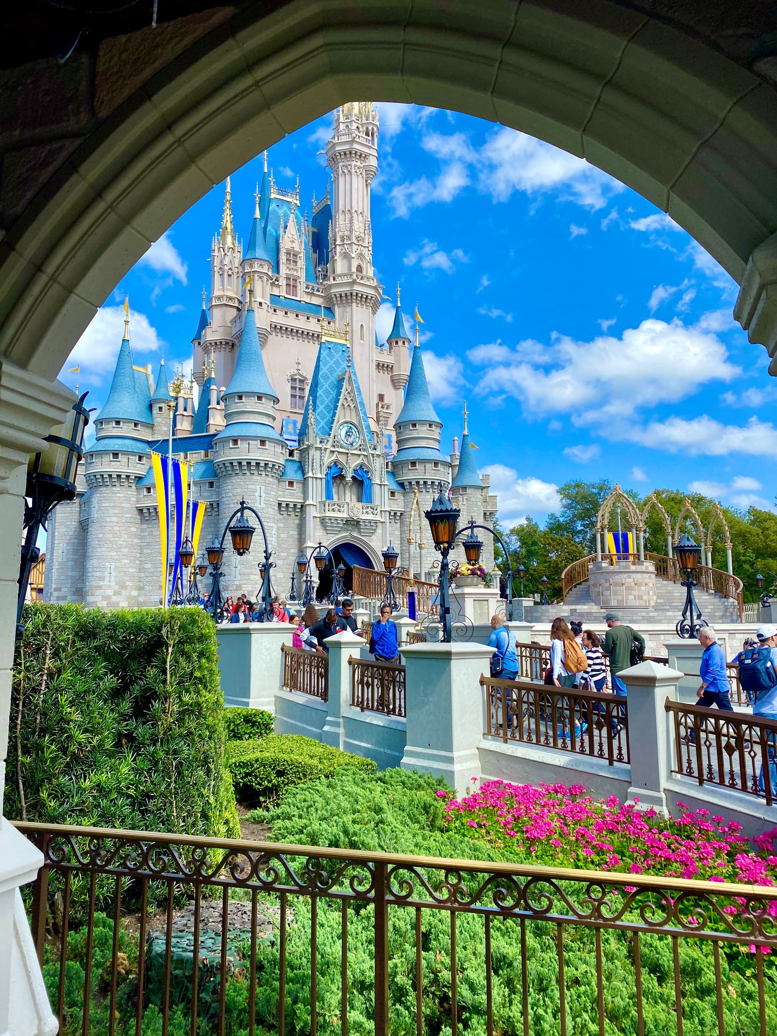 View of a castle and plants with blue skies during daytime