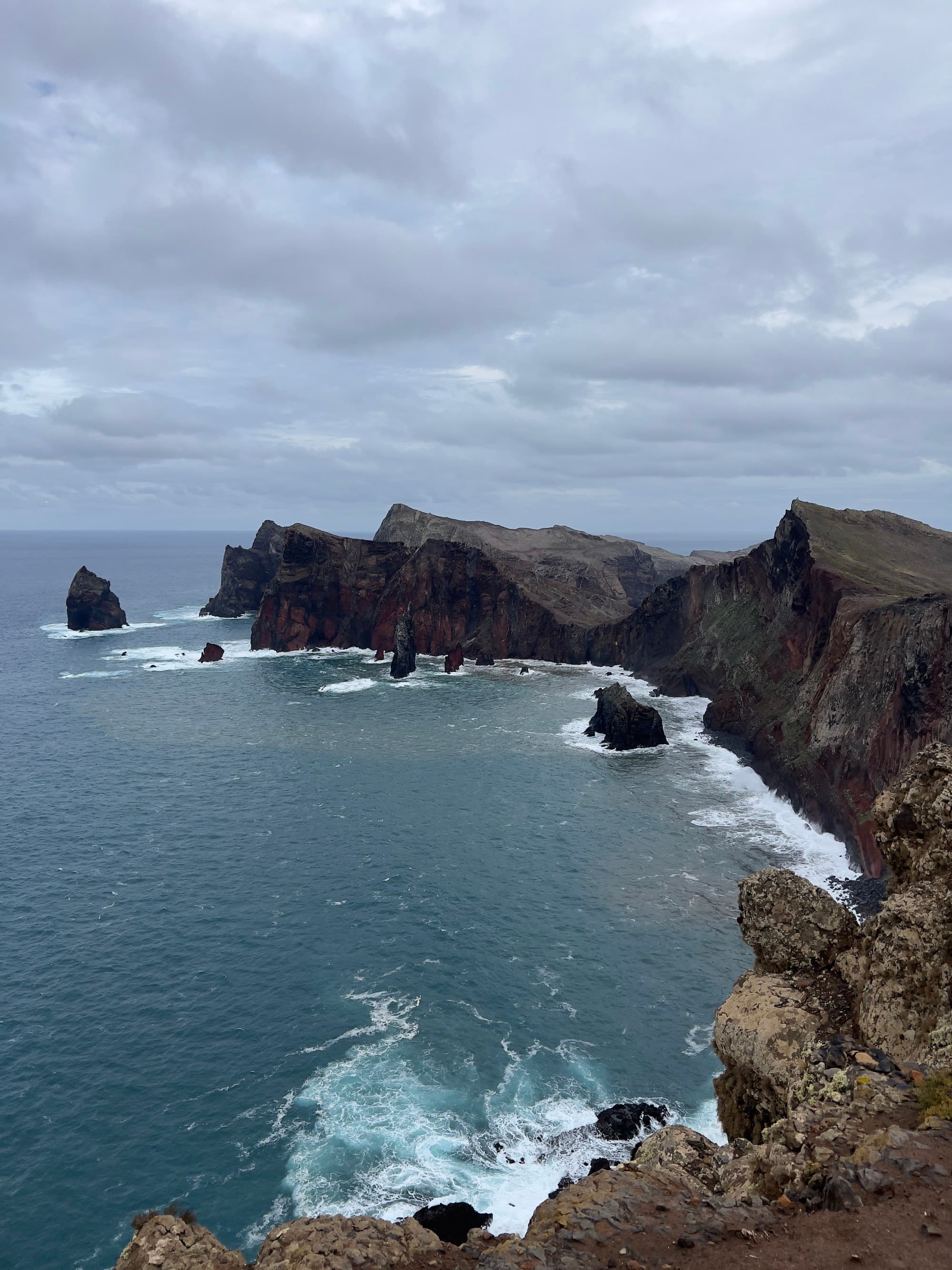 An aerial view of the sea near the cliff.