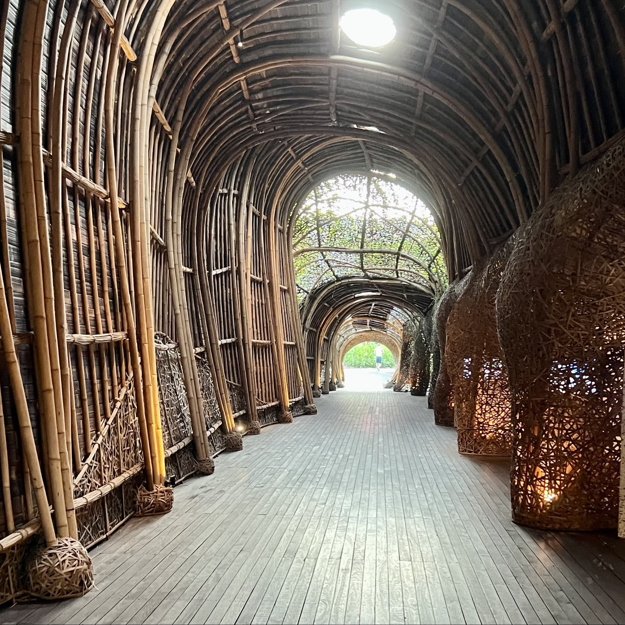 A picture of corridor made out of wood.