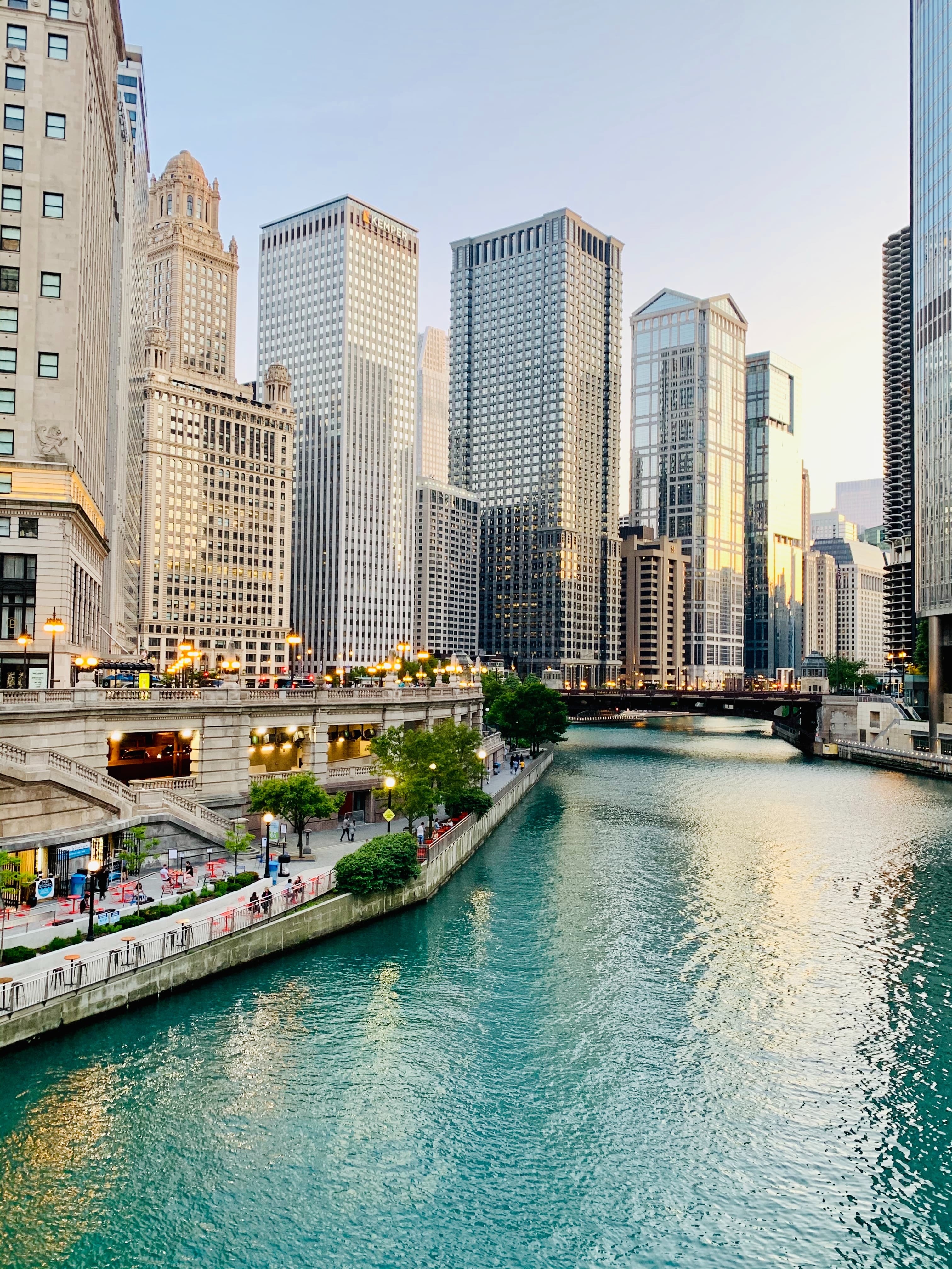 Chicago river framed by tall buildings.