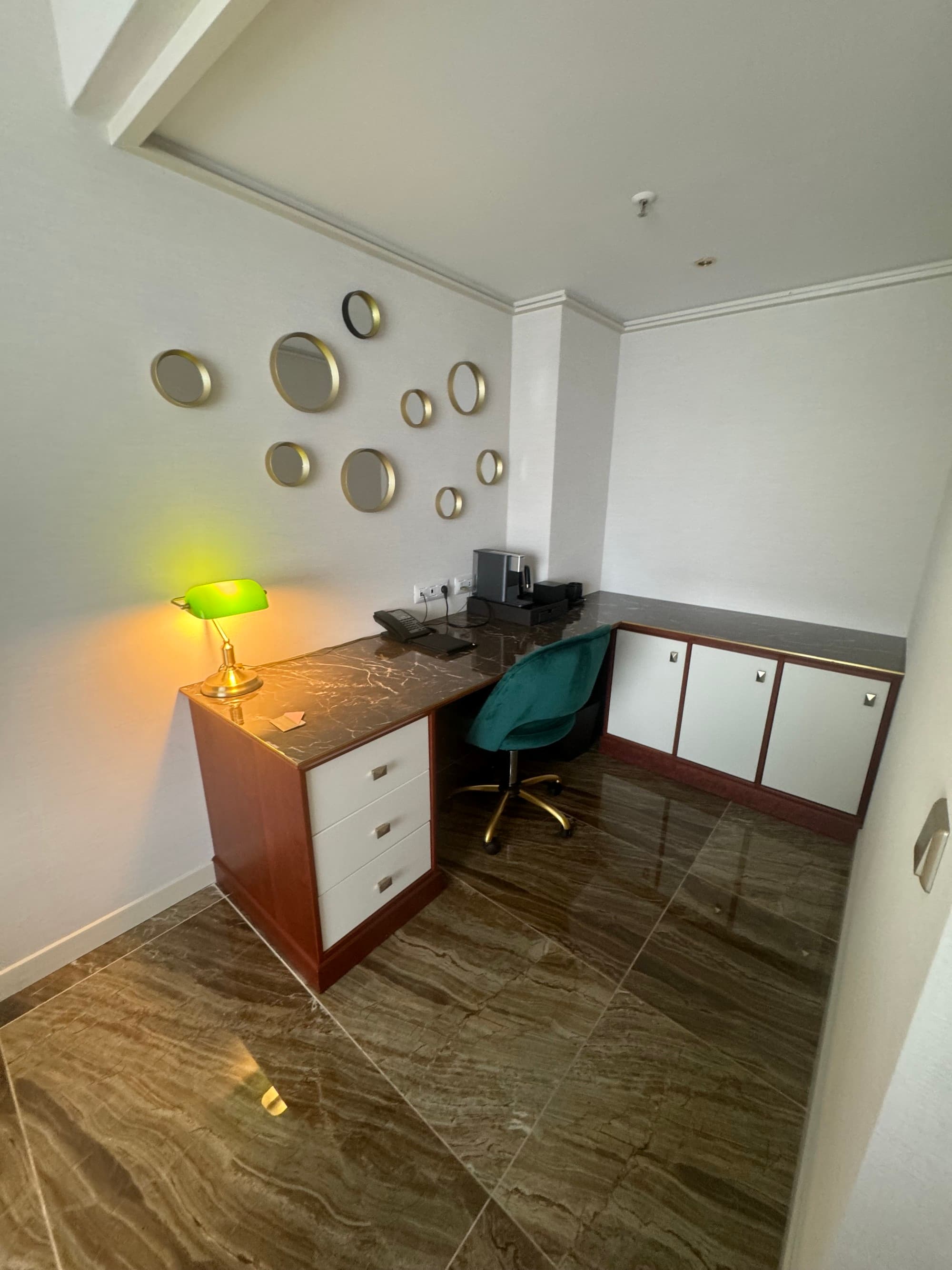 A desk in a hotel room