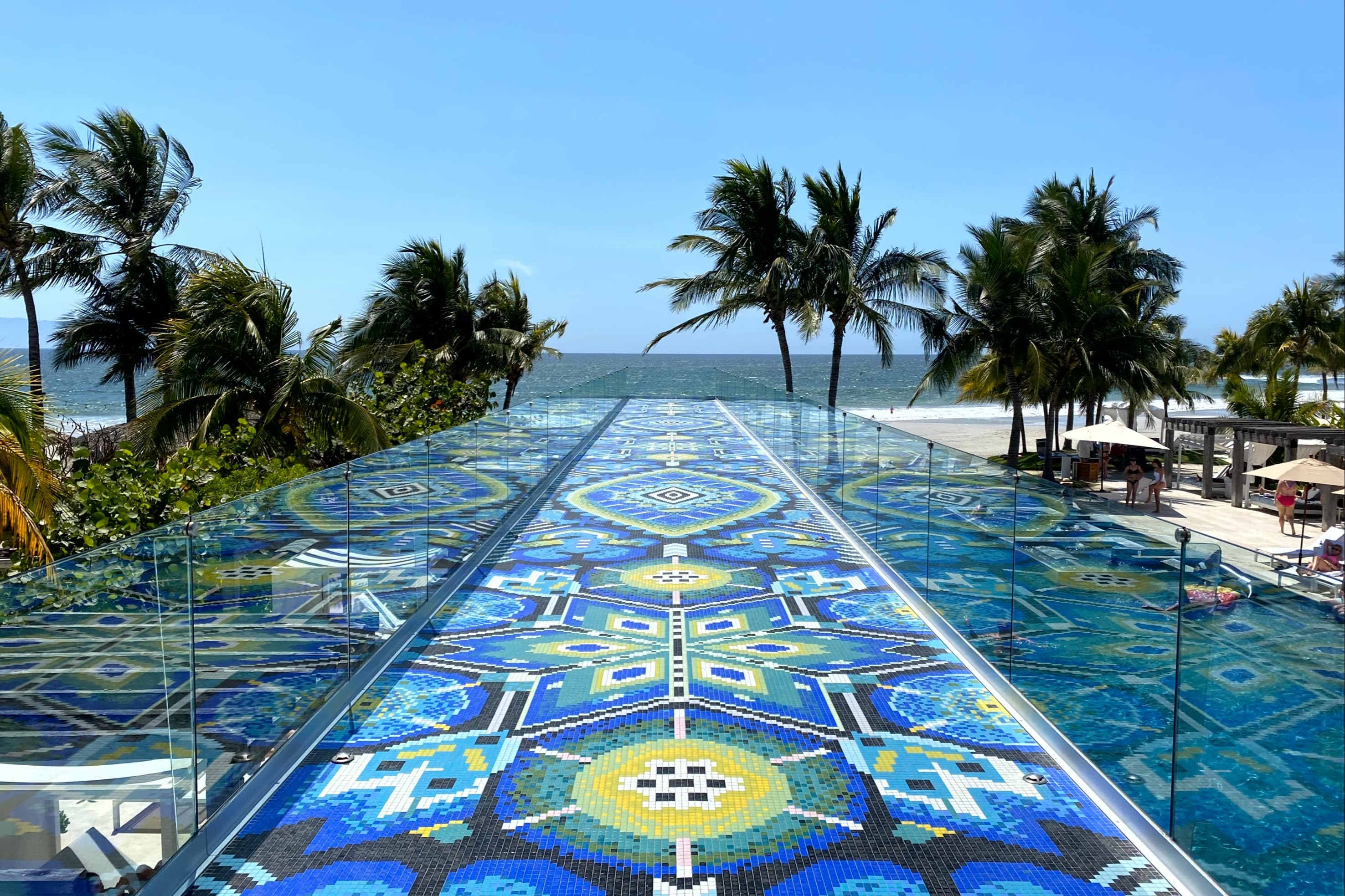 An aerial view of outdoor pool side during daytime.