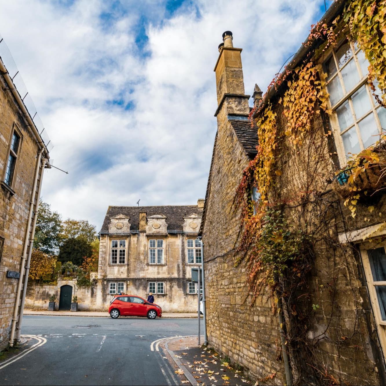 Traditional stone house on a street.