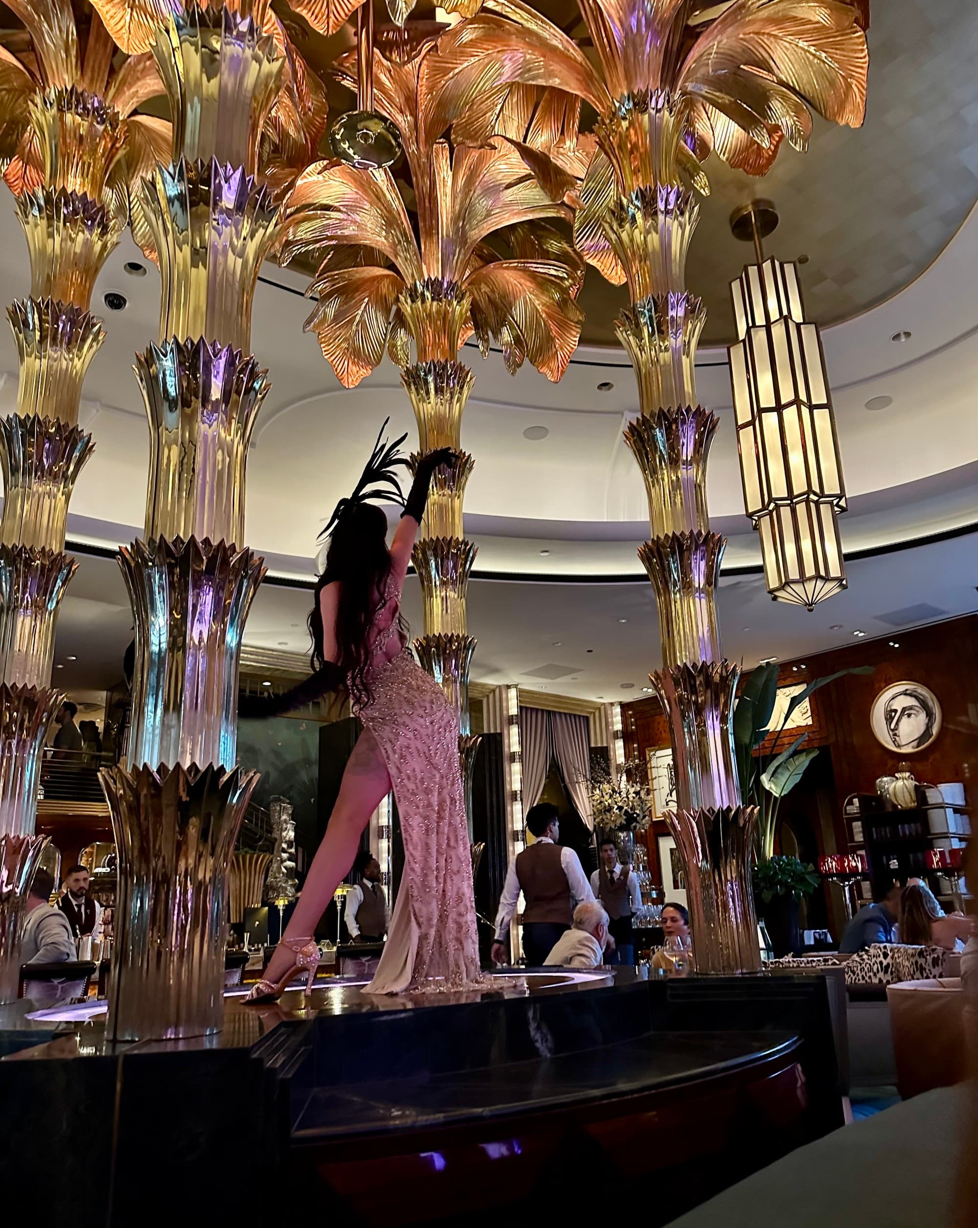 Dancers on stage in a restaraunt.