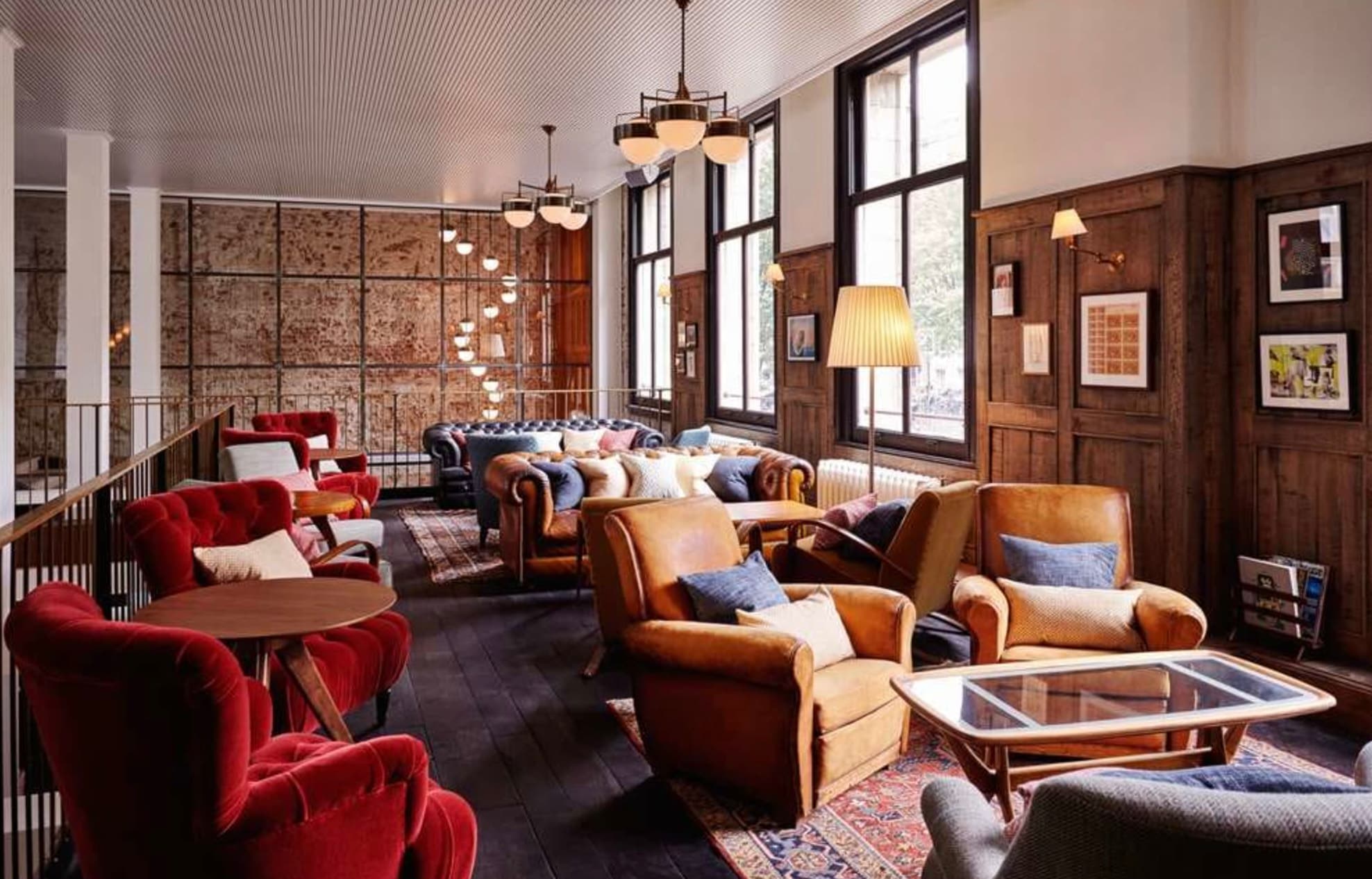 lobby area with club chairs and modern lighting