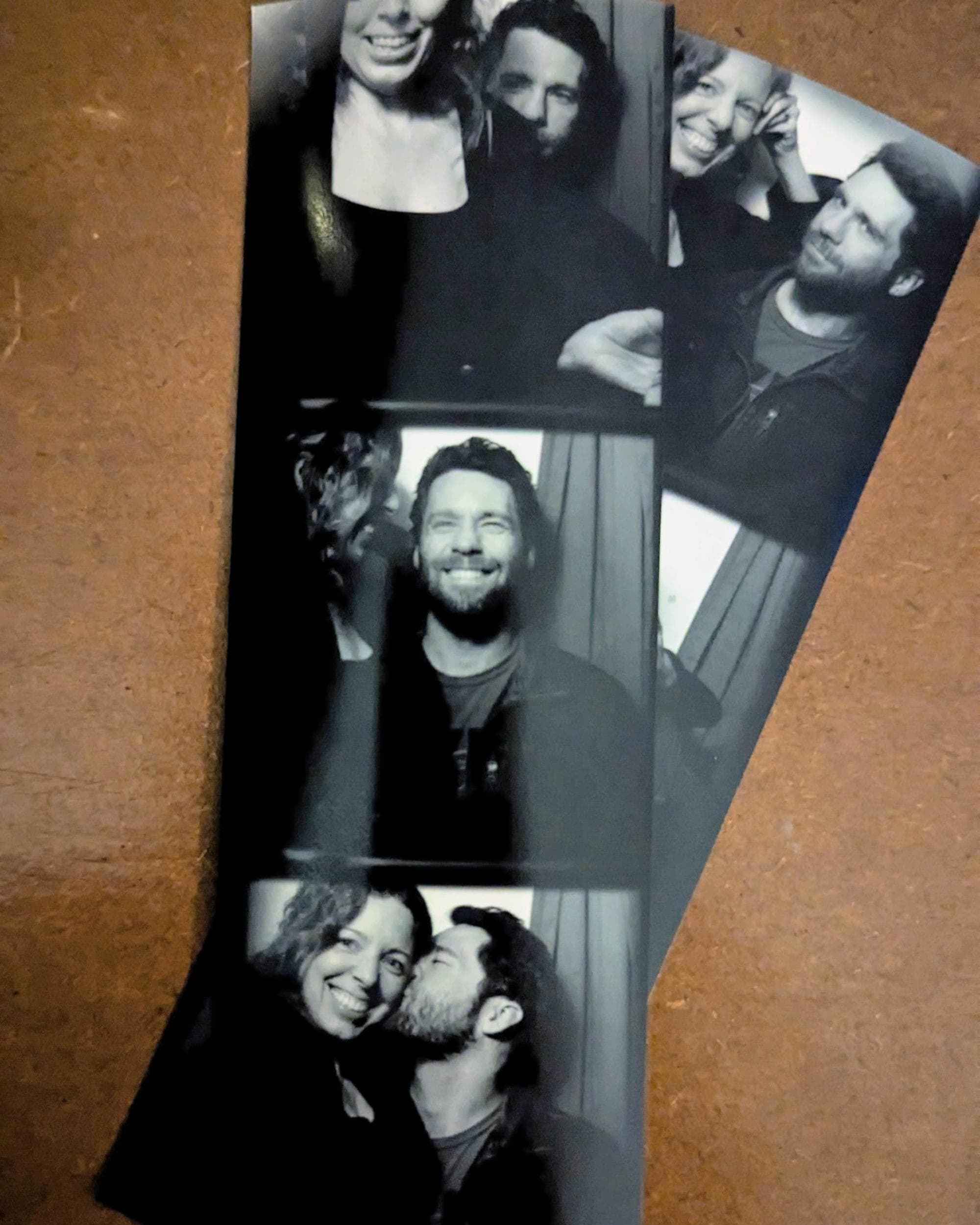 Photo booth strips with photos of a couple
