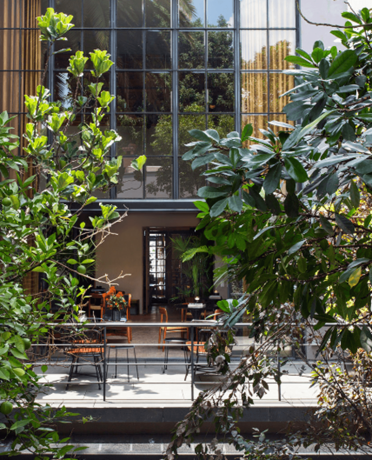 an outdoor patio brimming with plants