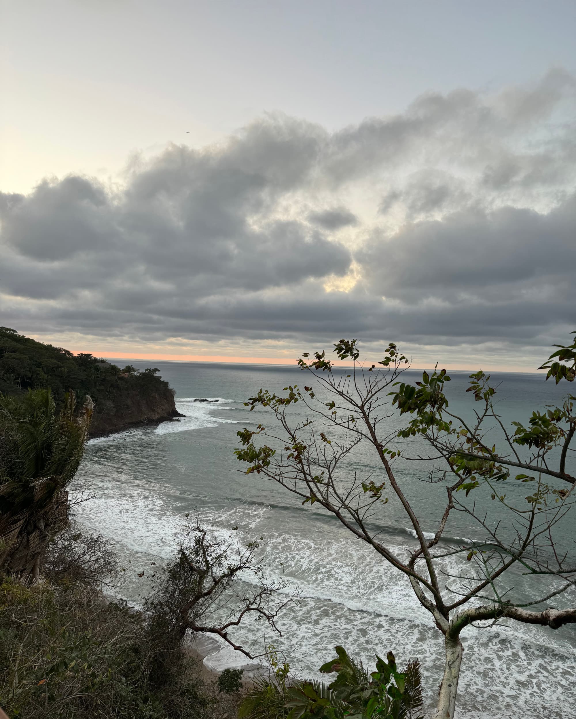 Rocky cliffs on a beach in the evening