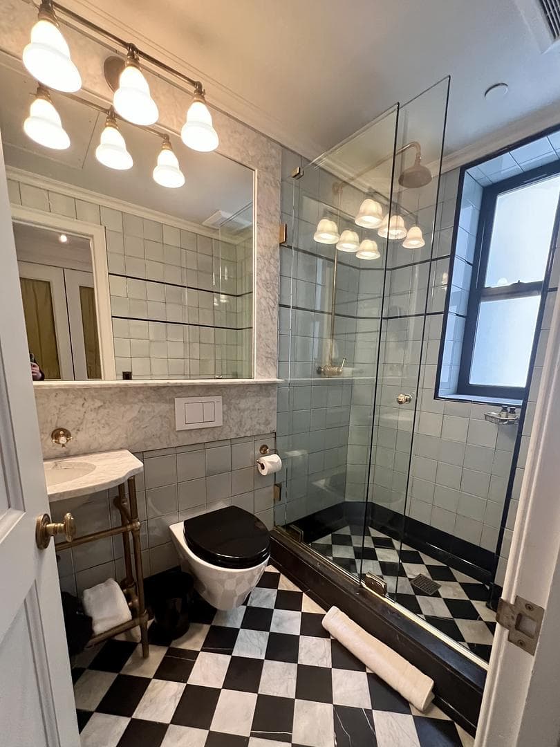 checked tiles and bath tub