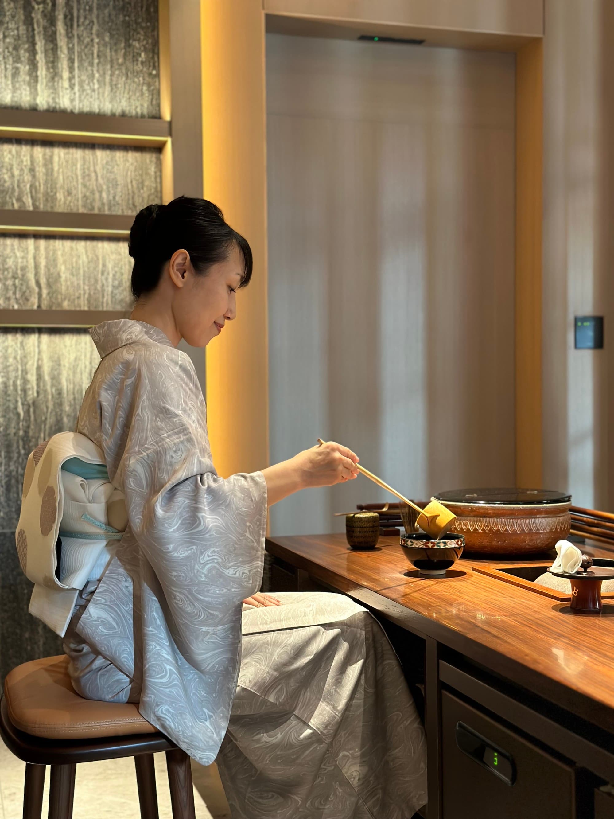 Female holding chopsticks
