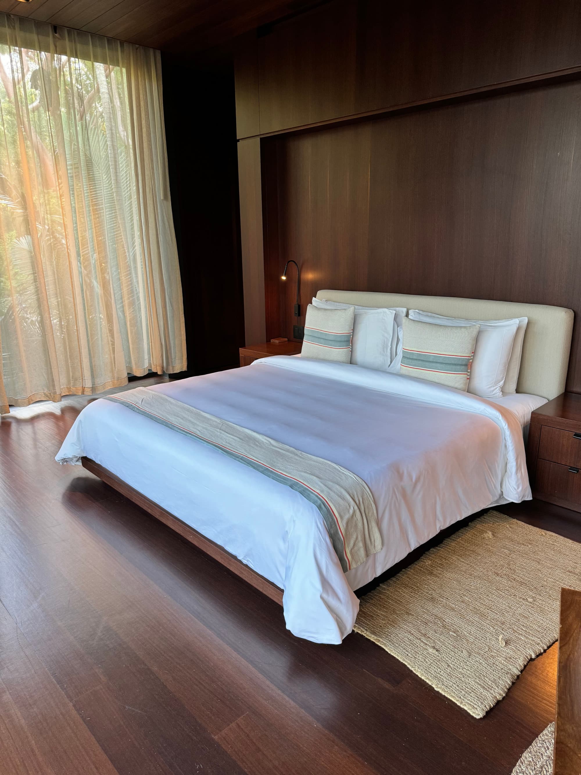 A large bed in a hotel room