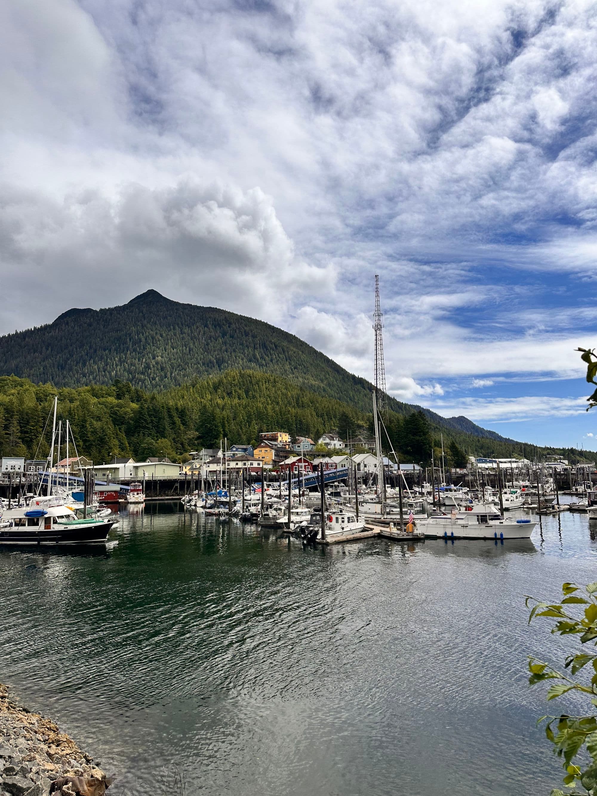 Habor with green mountains in the background.