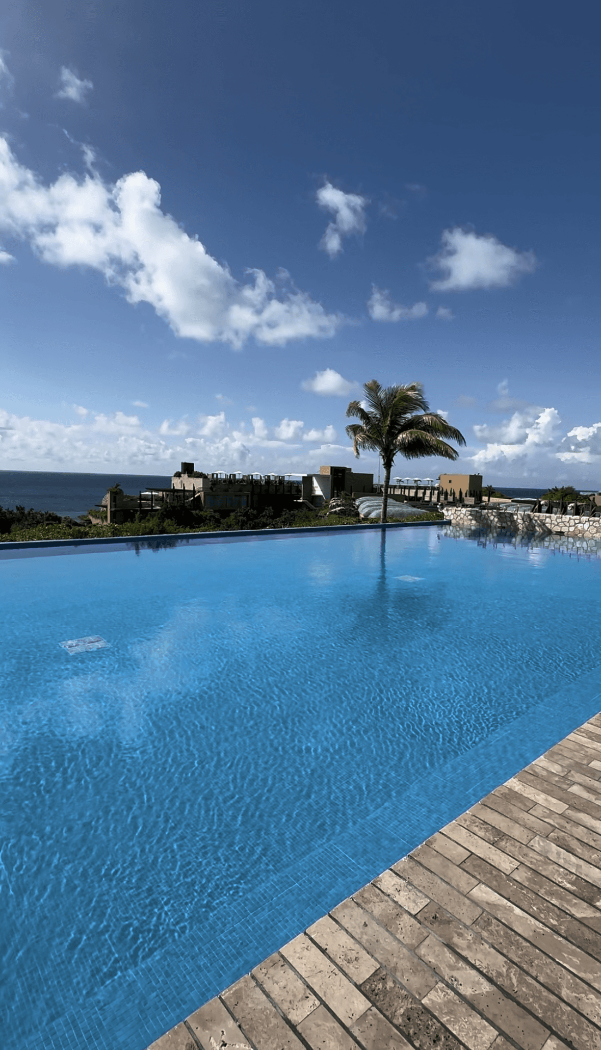 A swimming pool area outside during the daytime