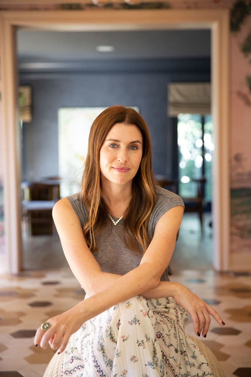 Fora Advisor Zoe Schaeffer sitting in hotel