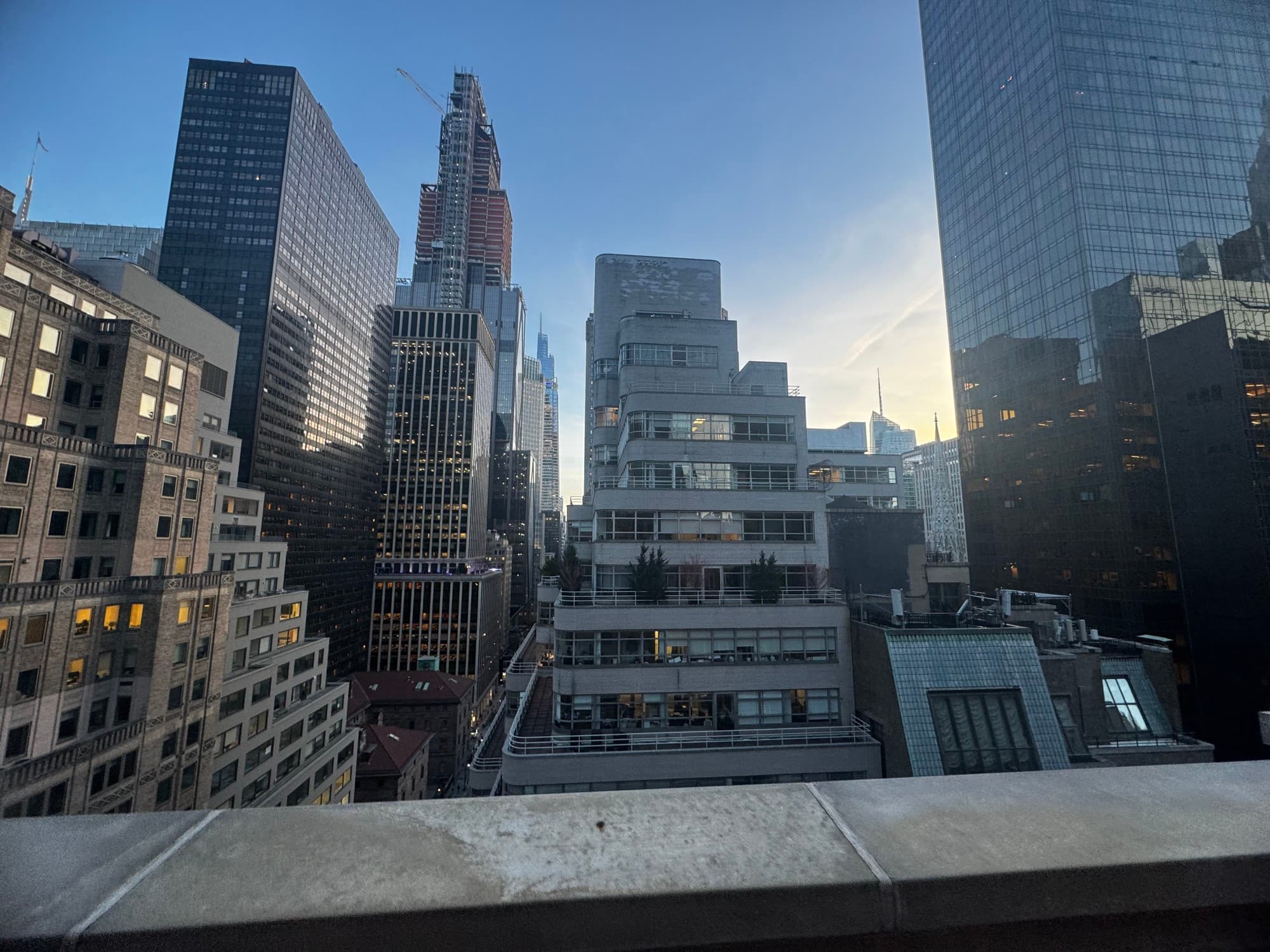 View of tall city buildings during the daytime