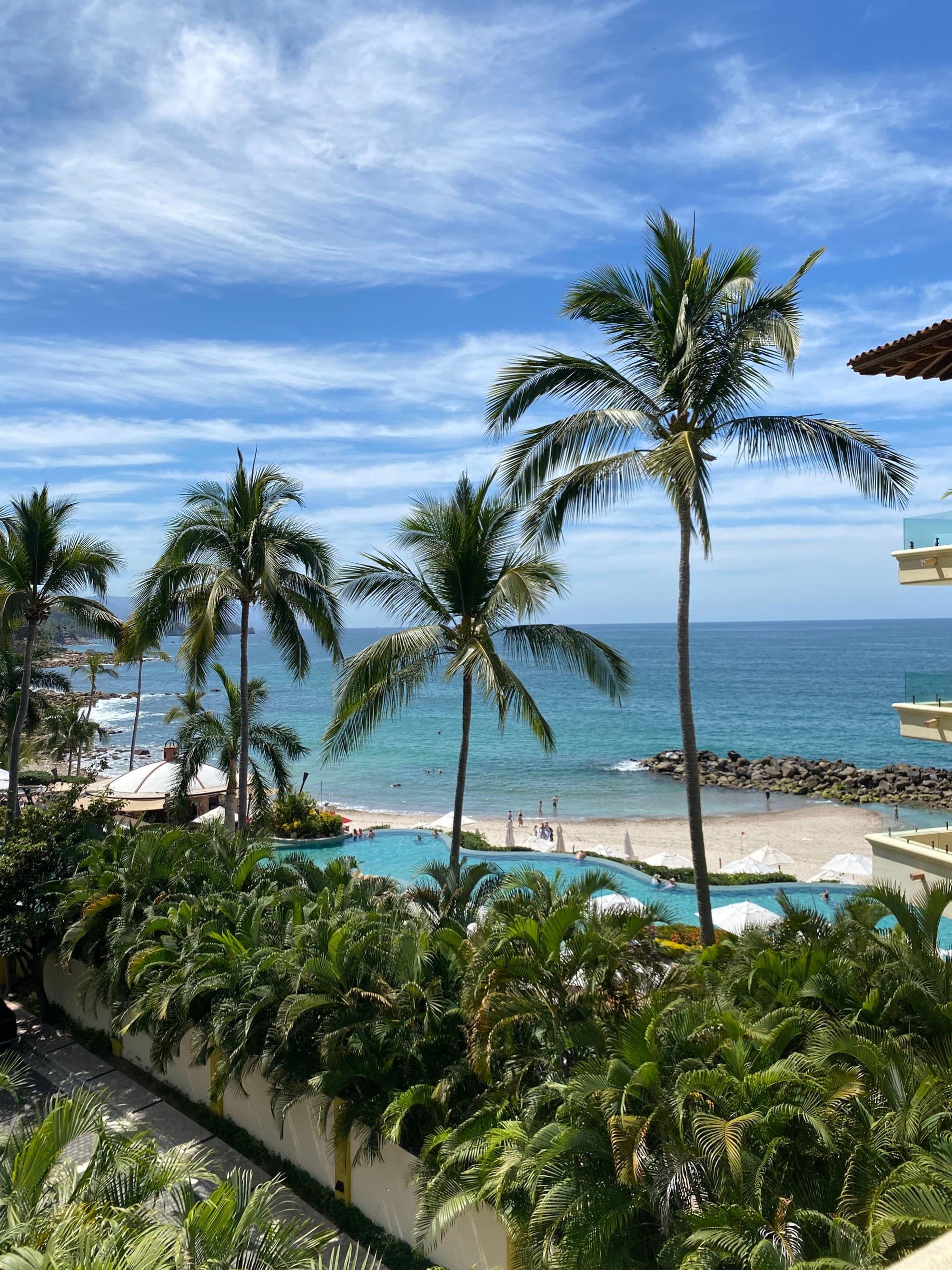 Pool area next to the beach during the daytime