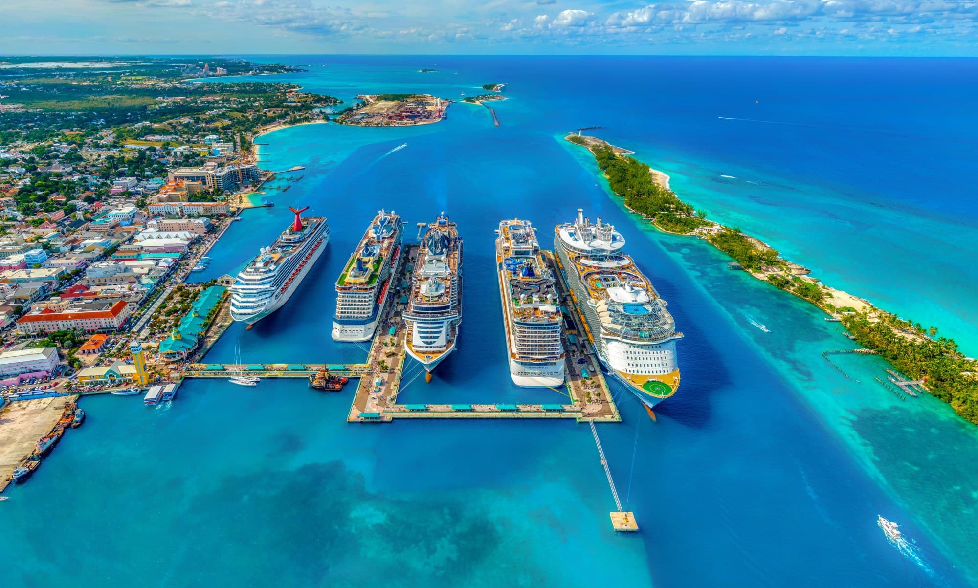 Aerial photography of white and blue cruise ships during daytime