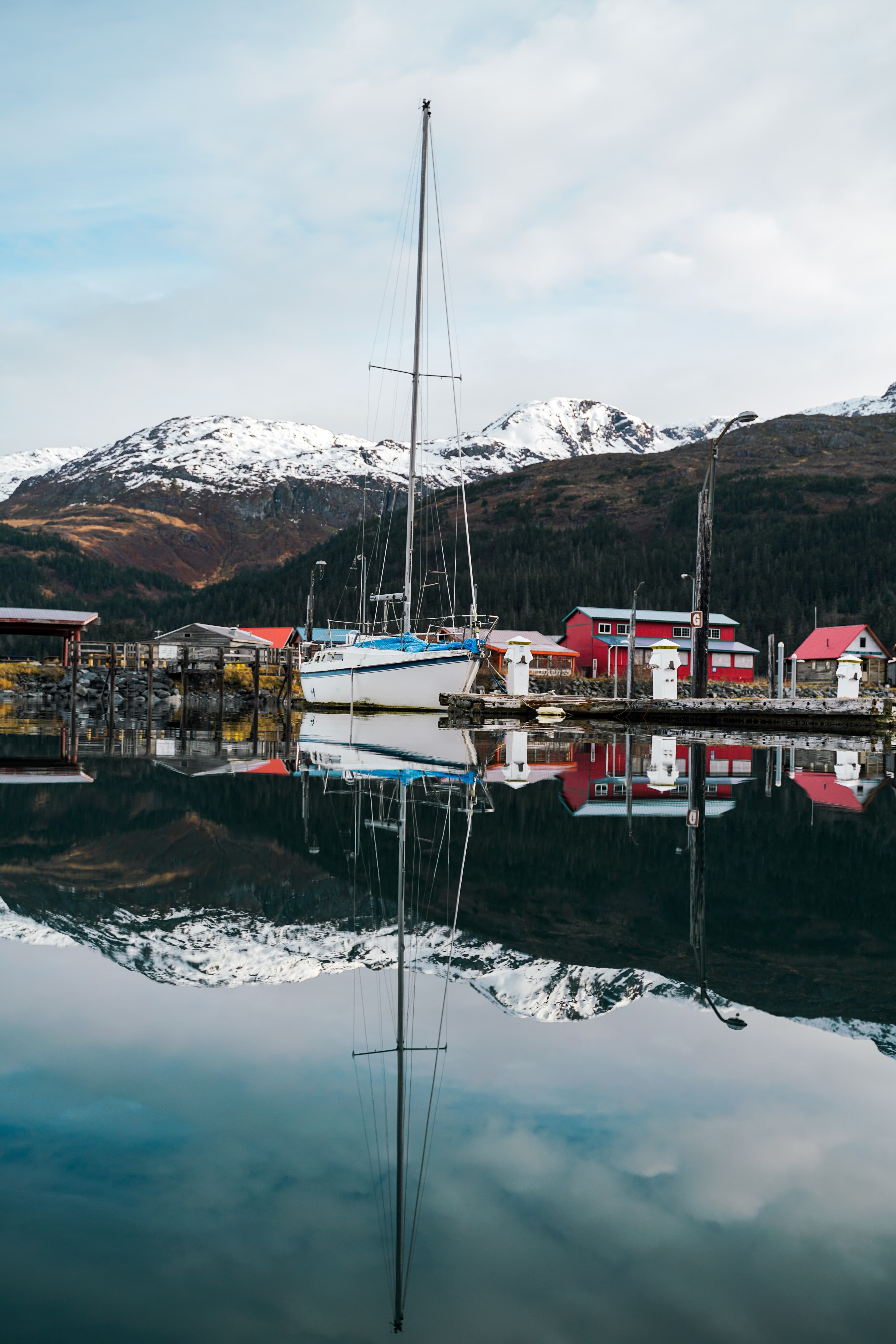 Boats on the side of a lake in Alaska.