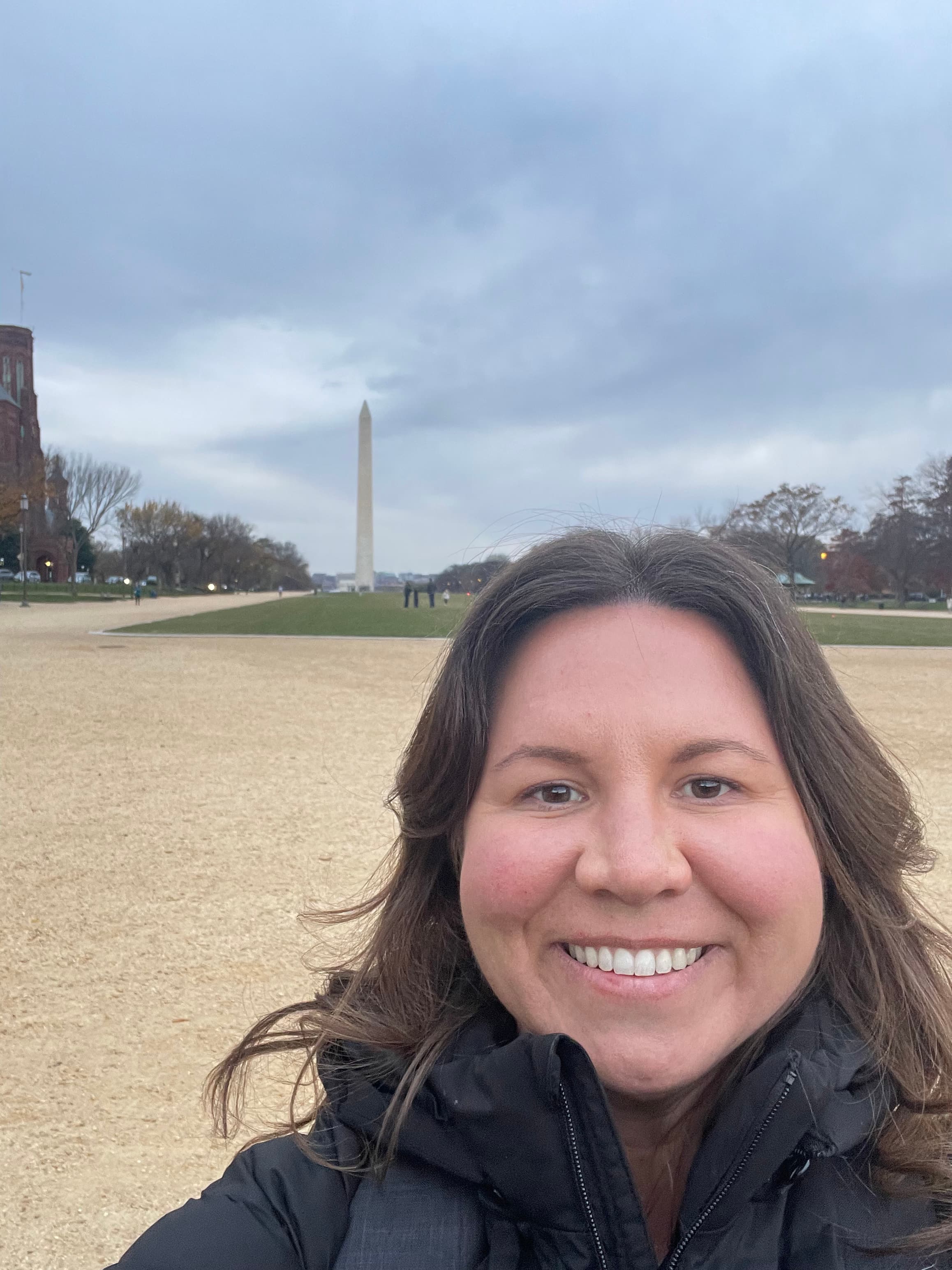 Travel advisor Tiffany posing with Washington Monument in view